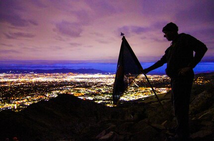 Army Reserve Command Sgt. Maj. Jeff Darlington, command sergeant major, 76th Operational Response Command, pauses to check out the view after making it to the top of the "Living Room" trail in Salt Lake City, Utah, Nov. 3.  The climb, led by Darlington and Brig. Gen. Doug Cherry, commanding general, 76th ORC was part of a team-building event at the annual Commander's Conference for brigade and battalion commanders and sergeant's major.  The trail ascents more than 1,000 feet in approximately 2.4 miles, taking hikers to an elevation of nearly 6,000 feet while providing breath-taking views of the Salt Lake Valley. (Official U.S. Army Reserve photo by Sgt. 1st Class Brent C. Powell