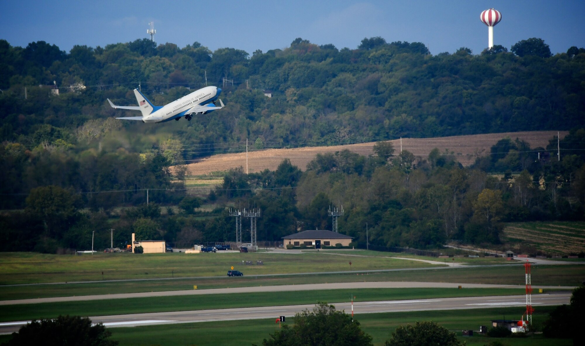 A 932nd Airlift Wing C-40C aircraft retracts tires and takes off on a training flight Oct 13, 2018, at Scott Air Force Base, Ill. The plane lifted off at a 15 degree angle at approximately 140 miles per hour before banking to the right.  The unit is responsible for maintaining and flying four of the distinguished visitor airlift planes for missions worldwide. The 932nd Airlift Wing is a 22nd Air Force unit, based in southern Illinois near the towns of Belleville, Mascoutah, and Shiloh. The 932nd Airlift Wing is the only reserve unit flying this unique mission under Air Force Reserve Command. Other major areas supporting the reserve unit are the 932nd Mission Support Group, the 932nd Medical Group, the 932nd Maintenance Group and the 932nd Operations Group. Citizen Airmen come from more than 35 states during 932nd Unit Training Assembly (UTA) weekends to be part of the reserve team. (U.S. Air Force photo by Lt. Col. Stan Paregien)