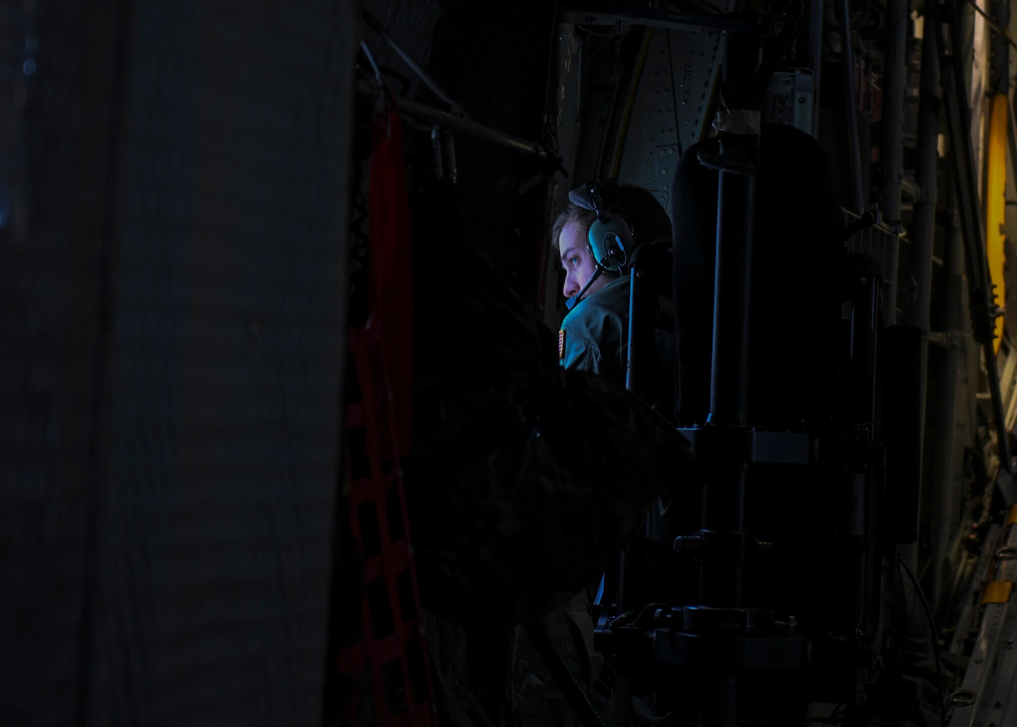 First Lt. John Pope, a pilot with the 757th Airlift Squadron sits in the co-pilot seat during a C-130H Hercules aircraft orientation flight for Junior Reserve Officer Training Corps cadets from Pine-Richland High School, Nov. 28, 2018.