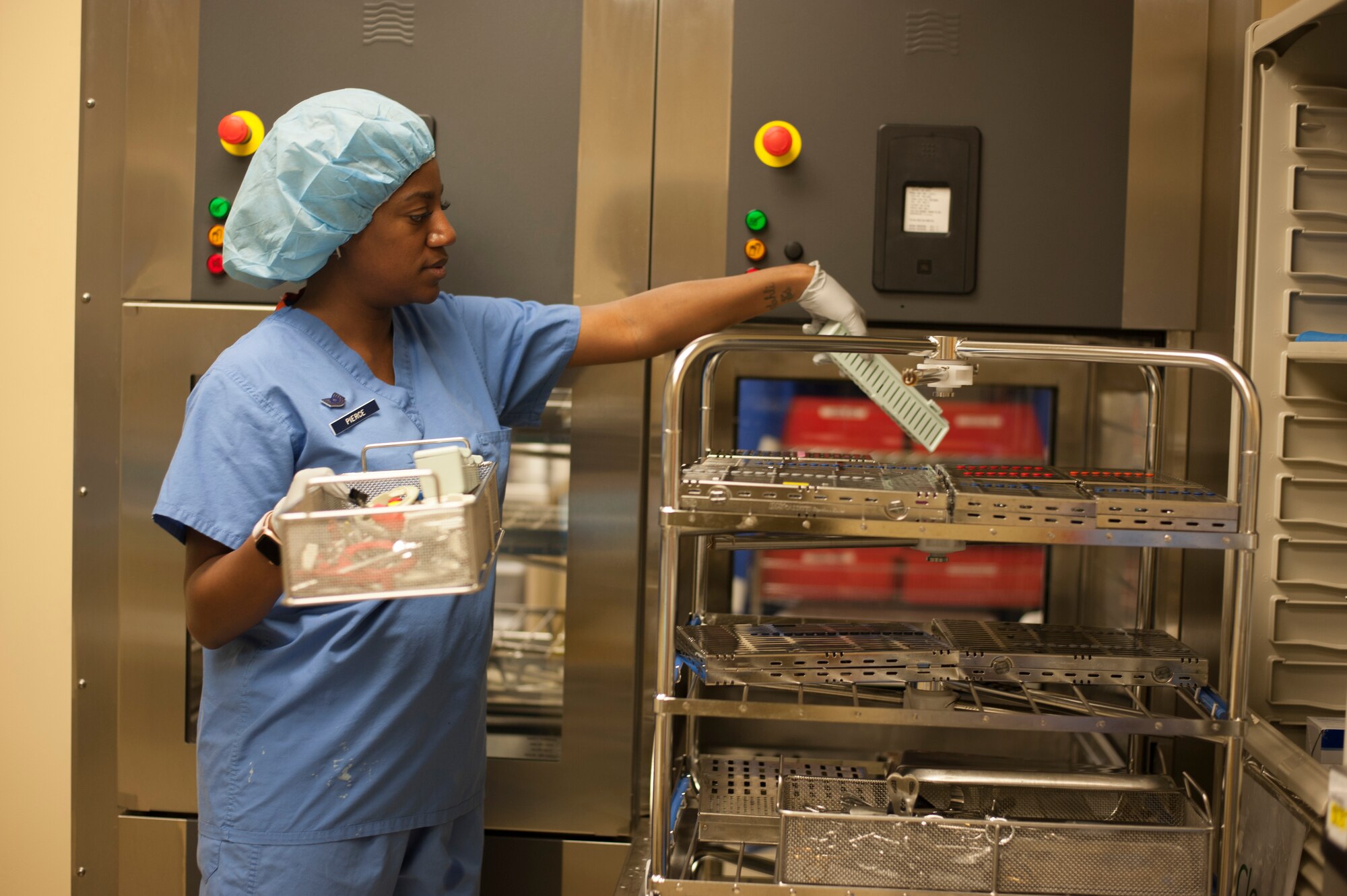 U.S. Air Force Tech. Sgt. Aza Pierce, 6th Dental Squadron NCO in charge of the dental instrument processing center, moves tools after sanitation at MacDill Air Force Base, Fla., Nov. 30, 2018.