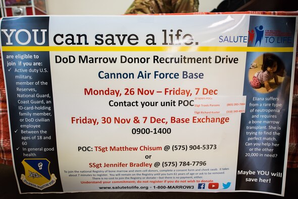 A poster with information on becoming a bone marrow donor hangs of the registration table at Cannon Air Force Base, New Mexico, Nov. 30, 2018. Registering takes about two minutes, and adds potential donors to a list of over one million people. (U.S. Air Force photo by Airman 1st Class Vernon Walter)
