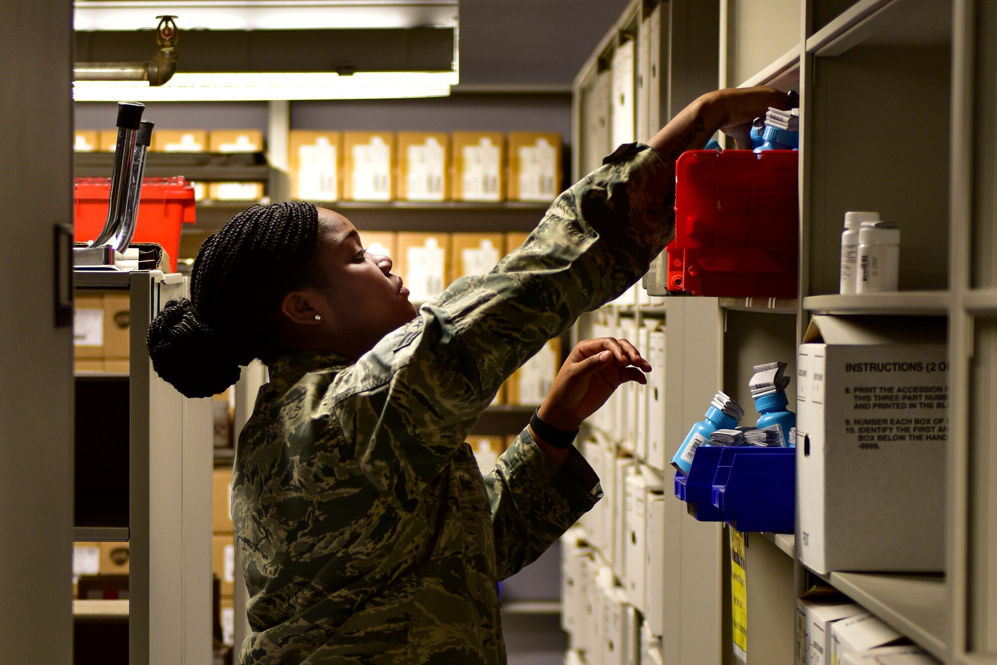 Airman 1st Class Rodtavia McCall, 377th Medical Support Squadron, medical logistics technician, stocks medical supplies at the 377th Medical Group in Albuquerque, N.M., Nov. 30, 2018. McCall is team member of the medical logistics flight that won Air Force Global Strike Command Medical Logistics Team of the Year. (U.S. Air Force photo by Airman 1st Class Austin J. Prisbrey)