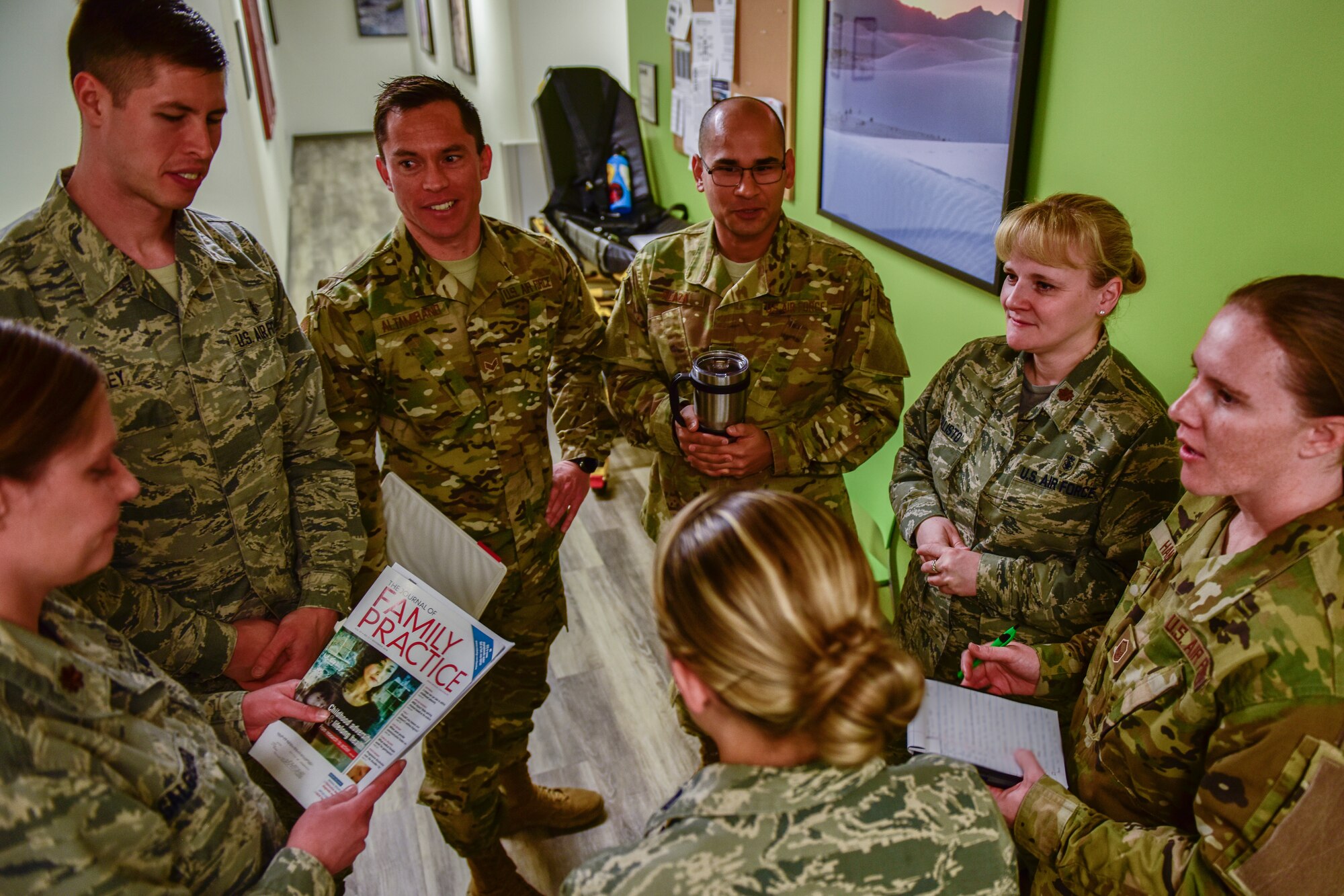 Members of the 377th Medical Operations Squadron, family health clinic, discuss the day’s events during their morning huddle at the 377th Medical Group in Albuquerque, N.M., Nov. 30, 2018. The family health clinic won the yearly Air Force Global Strike Command Outstanding Medical Home Award. (U.S. Air Force photo by Airman 1st Class Austin J. Prisbrey)