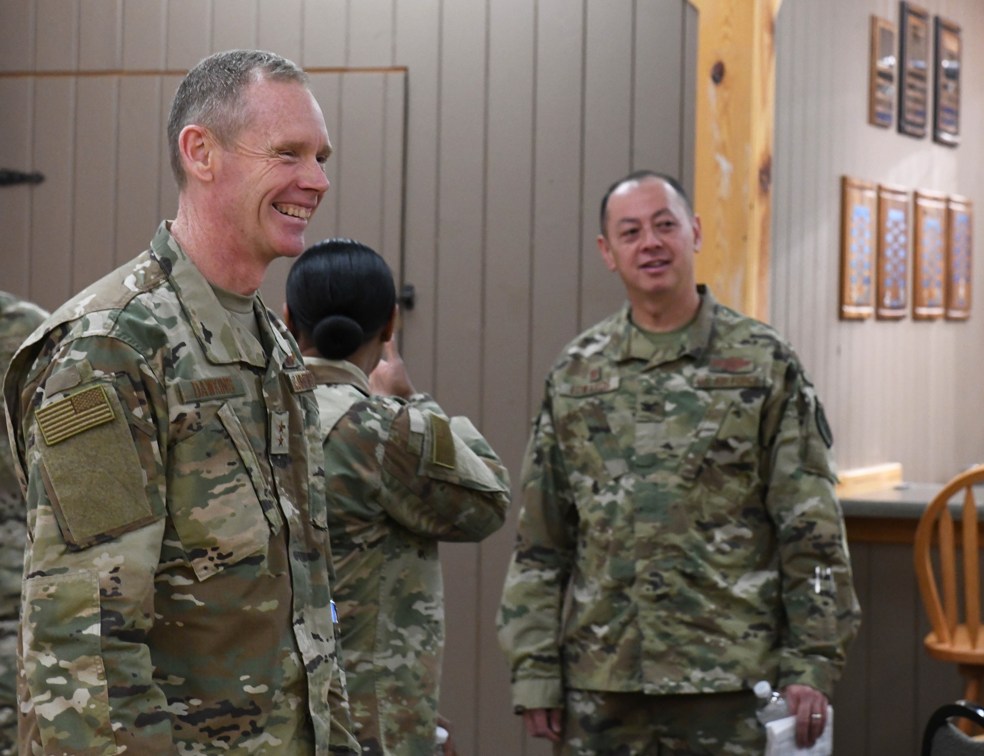 U.S. Air Force Maj. Gen. James Dawkins Jr., the 8th Air Force and Joint-Global Strike Operations Center commander, smiles while being briefed at the Base Defense Operations Center at Ellsworth Air Force Base, S.D., Nov. 13, 2018. Col. John Edwards, the 28th Bomb Wing commander accompanied him throughout his visit. (U.S. Air Force photo by Airman 1st Class Thomas I. Karol)