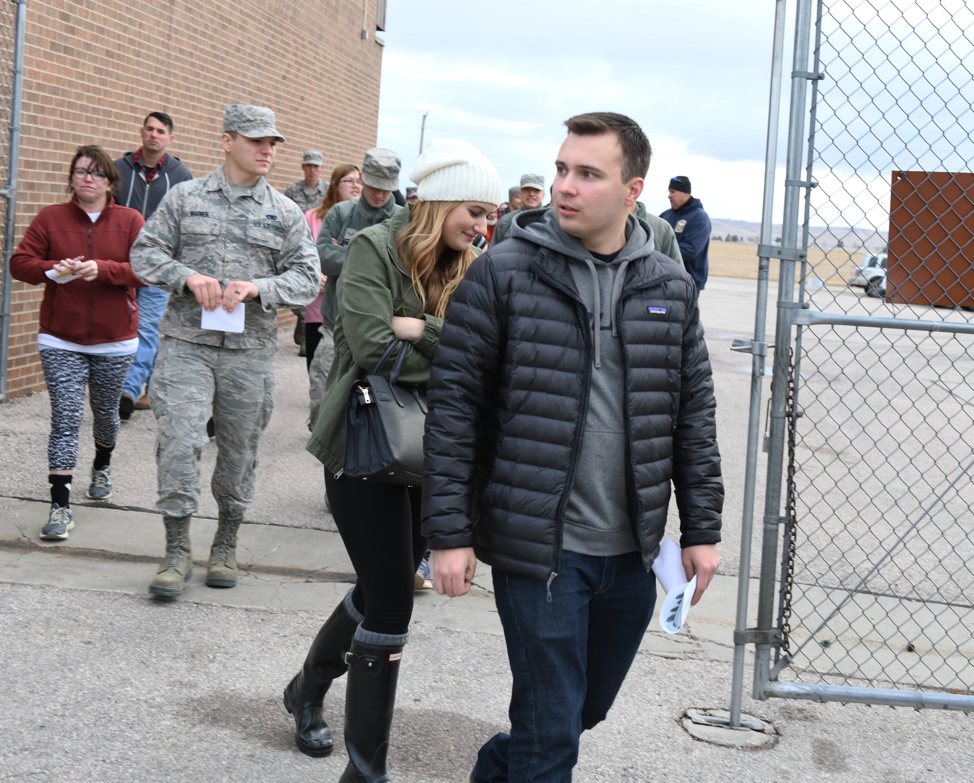 Service members and their families begin to look for a tree at Ellsworth Air Force Base, S.D., Nov. 30, 2018. Trees for Troops is an event where community members all over the country donate trees to service members so they can have a free tree for the holidays. (U.S. Air Force photo by Airman 1st Class Thomas Karol)