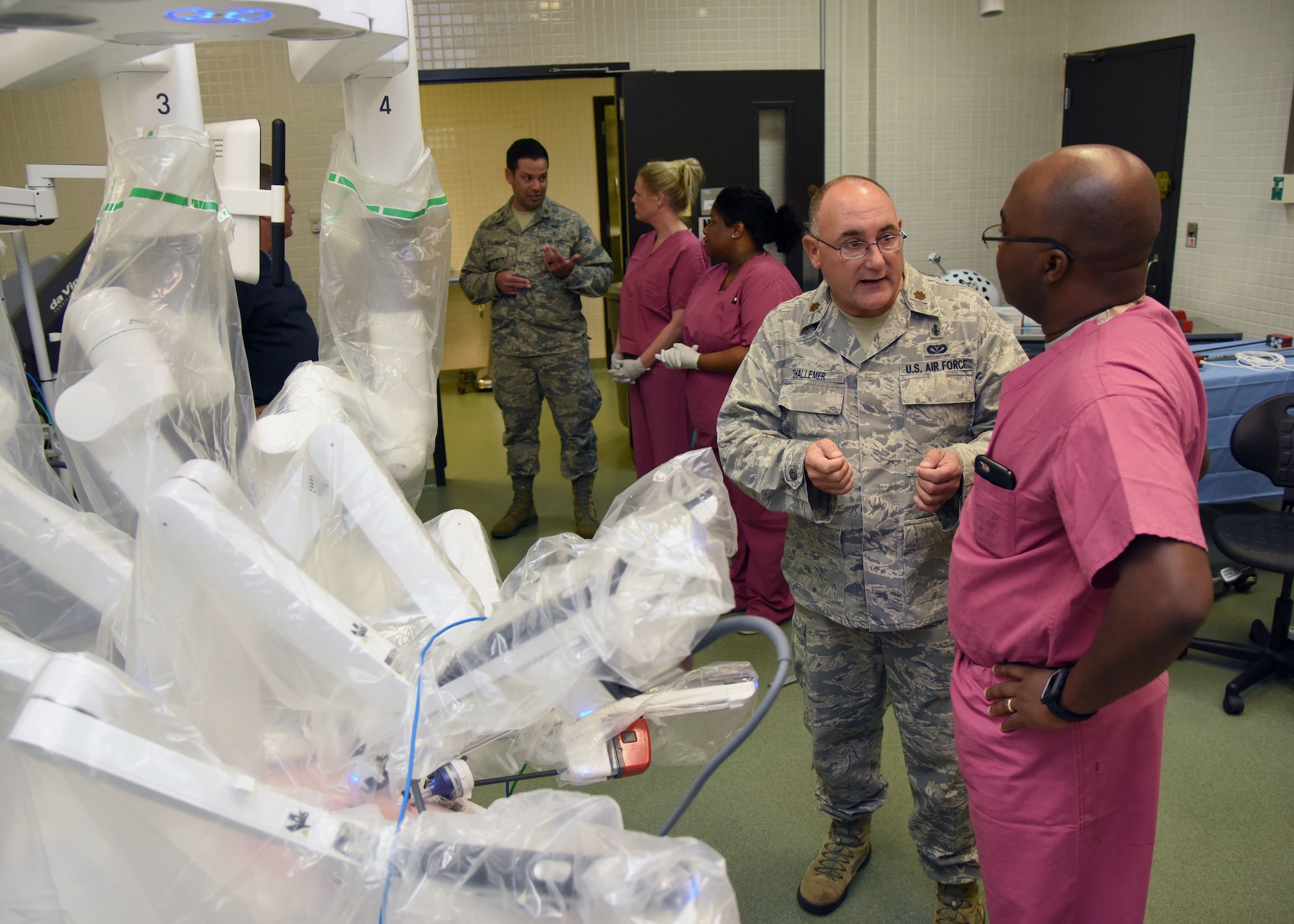 U.S. Air Force Maj. Scott Thallemer, 81st Surgical Operations Squadron Institute for Defense Robotic Surgical Education program coordinator, Keesler Air Force Base, Miss., and Maj. Joshua Tyler, InDoRSE program director, provide instruction to students during a robotics surgery training session at Keesler Air Force Base’s clinical research lab, Sept. 13, 2018. (U.S. Air Fore photo by Kemberly Groue)