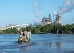 South Carolina National Guard Soldiers from the 125th Multi-Role Bridge Company, Abbeville, South Carolina, drive to a float bridge on the Sampit River in Georgetown, South Carolina, Sept. 26, 2018. The float bridge is used to transport main supplies to and from areas that can no longer be accessed by roadways.