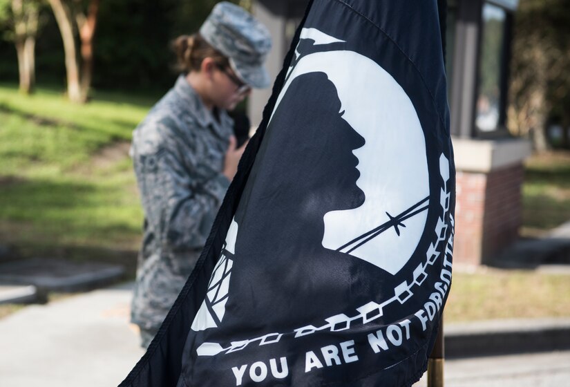 Airman 1st Class Summer Bell, 437th Maintenance Squadron munitions controller, reads the names of prisoners of war and those missing in action Sept. 28, 2018, at Joint Base Charleston, S.C.