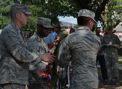 Base leadership present a wreath during a retreat ceremony Sept. 28, 2018, at Joint Base Charleston, S.C.