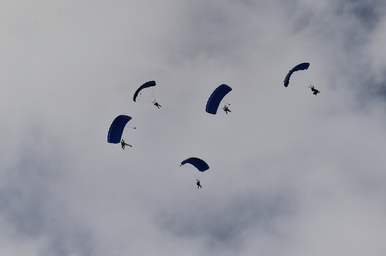 Special Tactics Airmen with the 24th Special Operations Wing parachute into the Windsor Locks amphitheater to kick off the U.S. Air Force Master Sgt. John Chapman Medal of Honor commemoration ceremony, Sept. 30, 2018, in Windsor Locks, Connecticut.