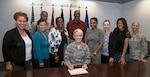 25. Joining Gen. Lenderman are (from left) are Chantelle Stoops, Family Advocacy Outreach Manager, JBSA-Lackland; Rose Padilla, Family Advocacy Program Assistance, JBSA-Lackland; Capt. Isaiah Jones, Family Advocacy Officer, JBSA-Lackland; Angela Nance Family Advocacy Intervention Specialist, JBSA-Randolph; Craig Hodge, Young Domestic Abuse Victim Advocate, JBSA; Jessica Reynolds, Family Advocacy Outreach Manager, JBSA-Fort Sam Houston; Irina Adams, Family Advocacy Intervention Specialist, JBSA-Fort Sam Houston; Stephanie Smith, Family Advocacy Officer, JBSA-Fort Sam Houston; and Chief Master Sgt. Heather Ransom, interim 502 ABW/JBSA Command Chief.