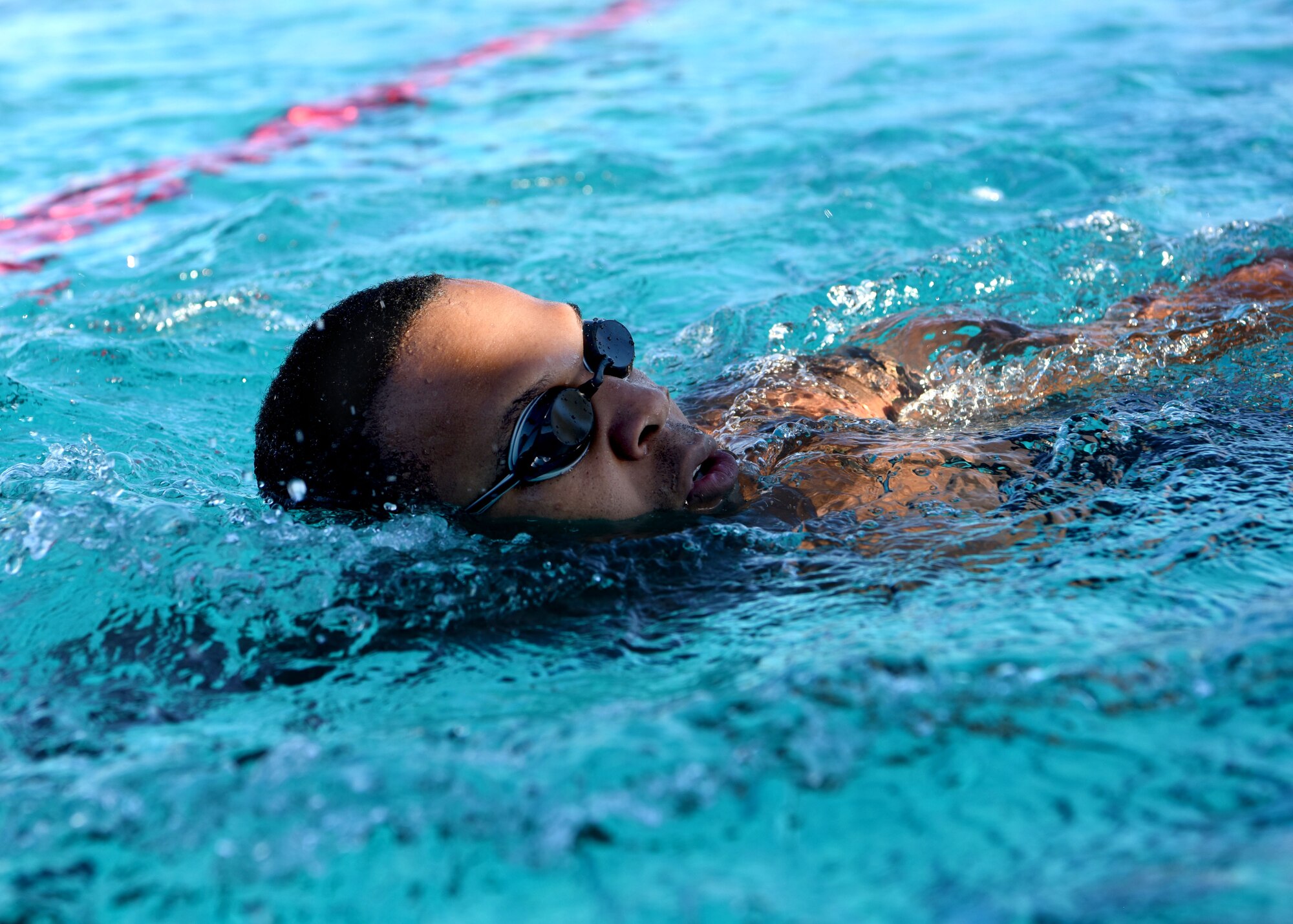 A member of the 56th Fighter Wing competes in the swimming portion of a triathlon during the third annual Thunderbolt Cup Sept. 28, 2018, at Luke Air Force Base, Ariz.