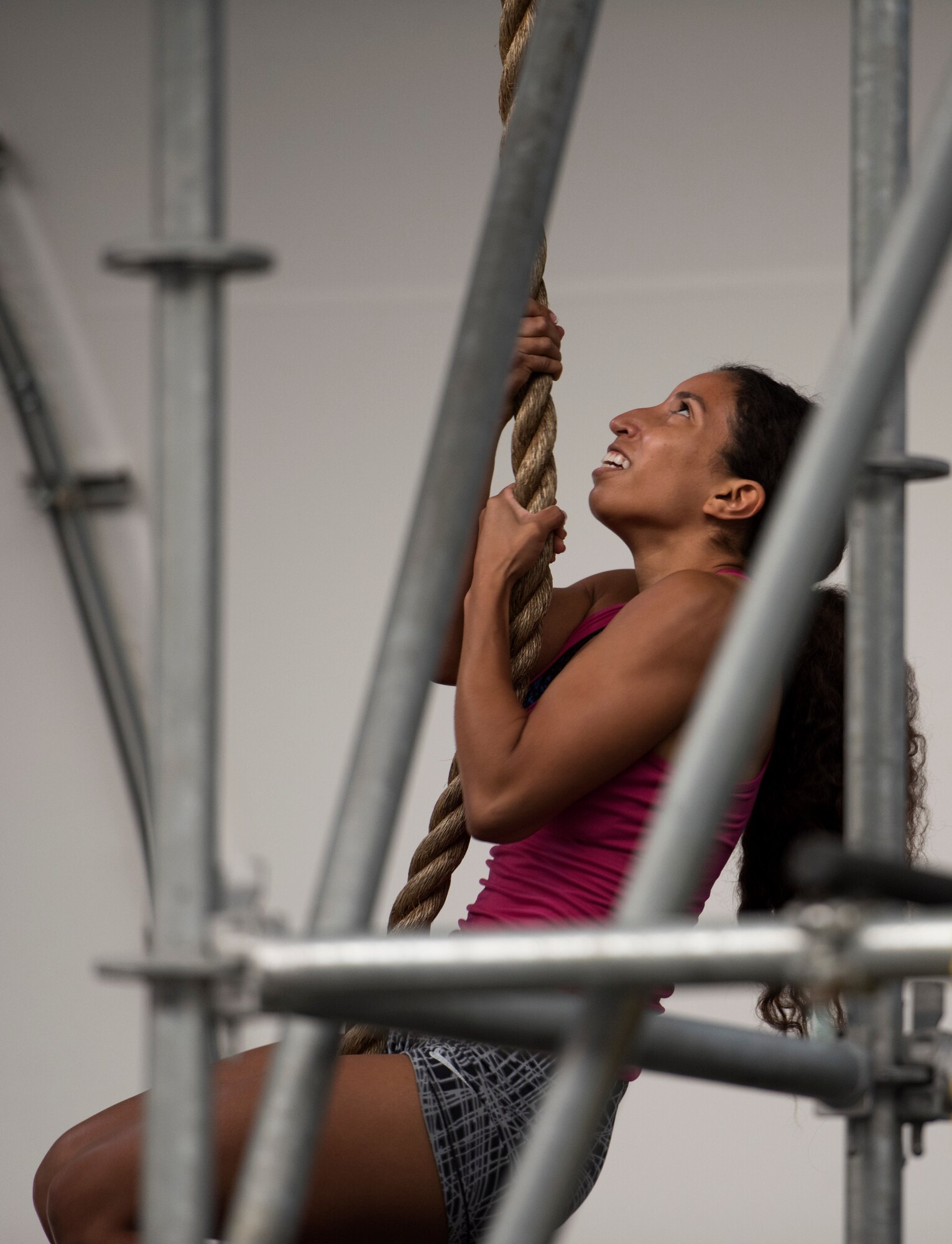 An Airman climbs a rope during the Alpha Warrior challenge, one of numerous athletic events during the Thunderbolt Cup Feb. 28, 2018, at Luke Air Force Base, Ariz.