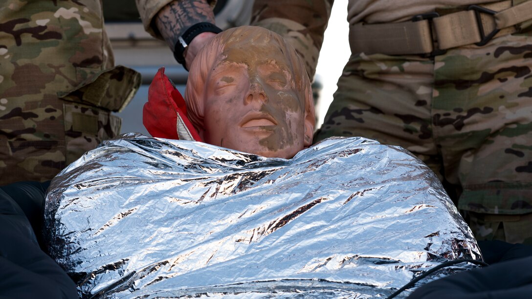 A training dummy lies strapped to a life raft during a full mission profile exercise at Oxnard, Calif., Sept. 18, 2018. Airmen boarded a U.S. Coast Guard boat and tested search and rescue operations with cooperating aircraft. An FMP provides participants the opportunity to refine their tactics, techniques and procedures in operating in a maritime environment. (U.S. Air Force photo by Staff Sgt. Michael Washburn)