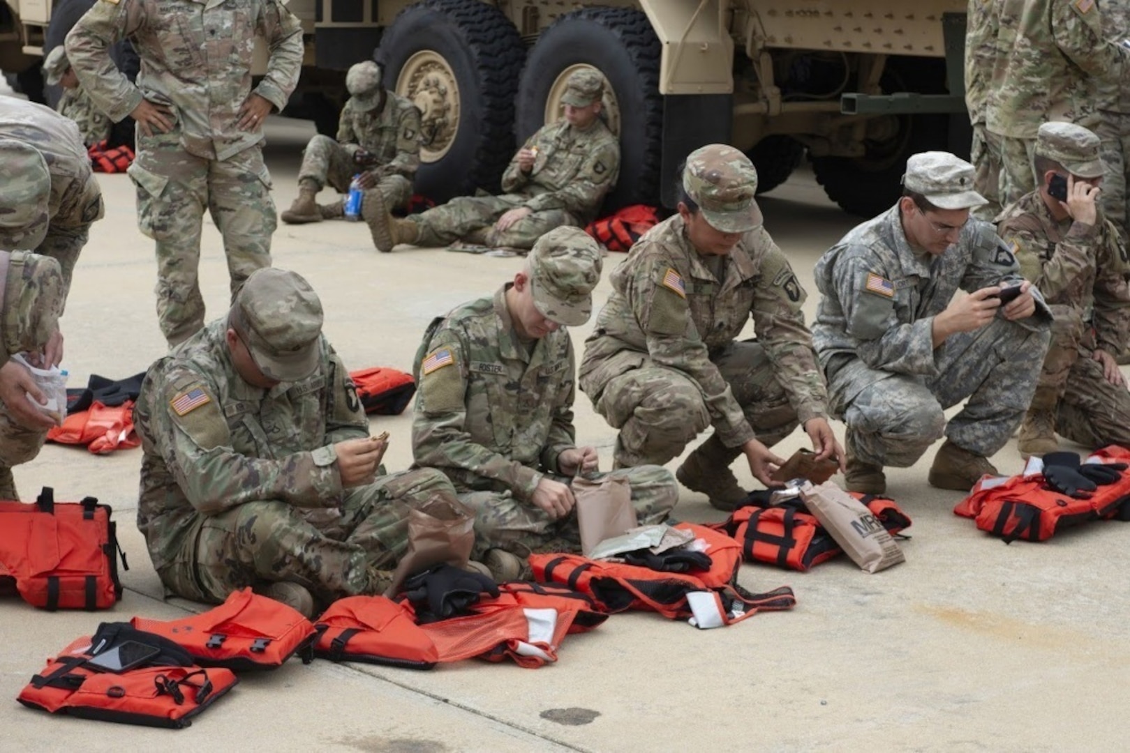Soldiers with the 74th Composite Truck Company, 129th Combat Support Sustainment Battalion, 101st Sustainment Brigade, 101st Airborne Division rest at Fort Bragg, North Carolina, Sept. 22, 2018. The soldiers have been conducting high-water rescue and relief operations in Lumberton, North Carolina. The soldiers deployed from Fort Campbell, Kentucky, to assist with the response to Hurricane Florence.