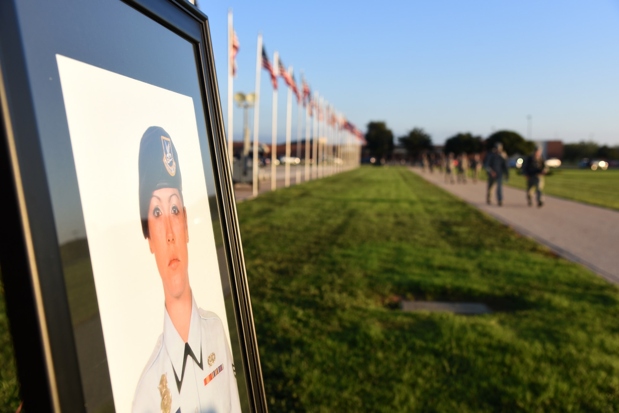 Airmen cross the finish line for the Airman 1st Class Jacobson Memorial March at the parade field on Goodfellow Air Force Base, Texas, Sept. 28, 2018. Airman 1st Class Elizabeth Jacobson was killed in action Sept. 28, 2005, on patrol near the Iraqi town of Safwan. (U.S. Air Force photo by Staff Sgt. Joshua Edwards/Released)