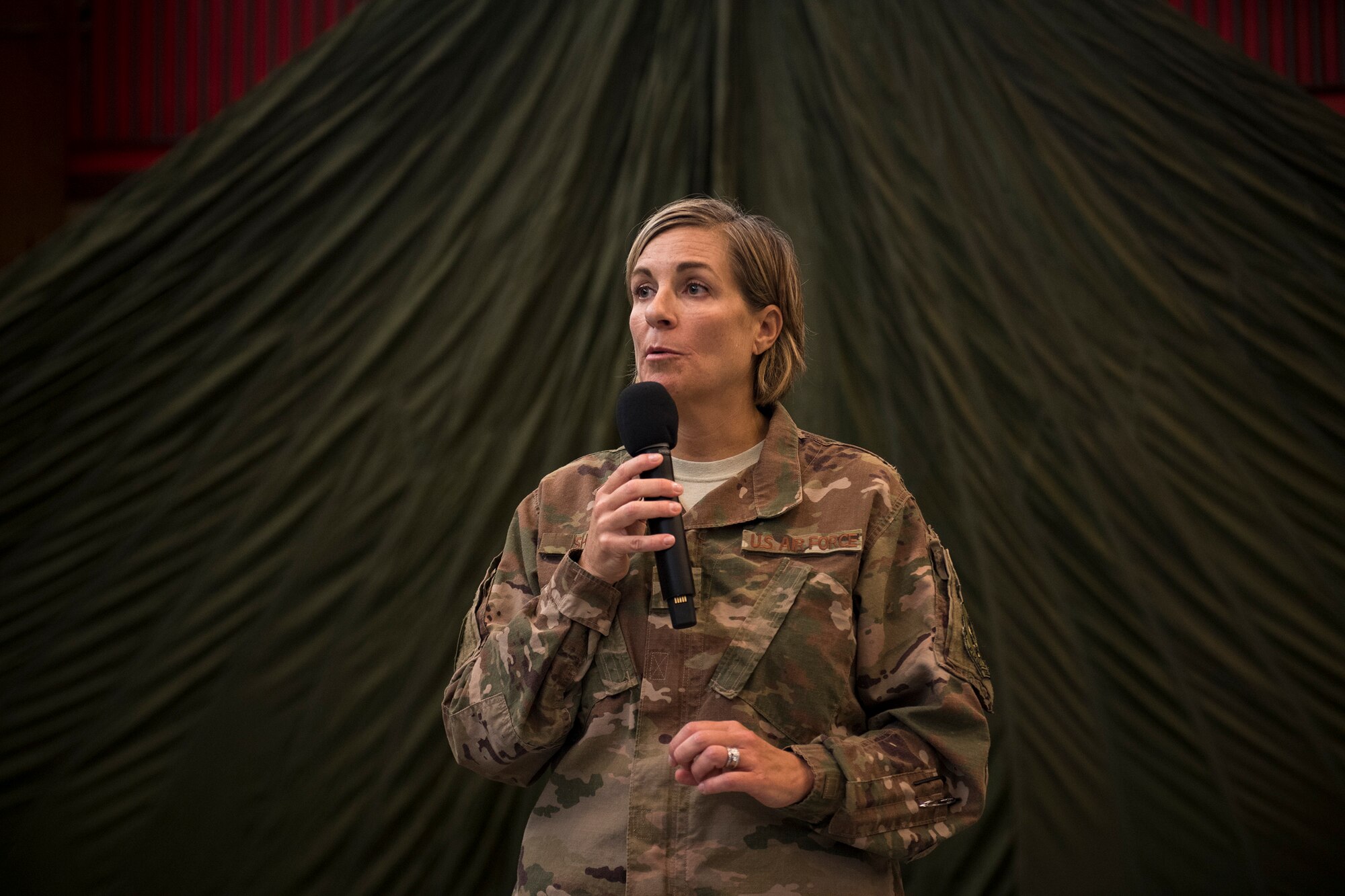 Col. Jennifer Short, 23d Wing commander, gives remarks during her final commander’s call to the 563d Rescue Group, Sept. 27, 2018, at Davis-Monthan Air Force Base, Nev. Effective 1 Oct., the 563d RQG and its associated maintenance squadrons will be realigned from the 23d WG to the 355th Fighter Wing. (U.S. Air Force photo by Staff Sgt. Ryan Callaghan)
