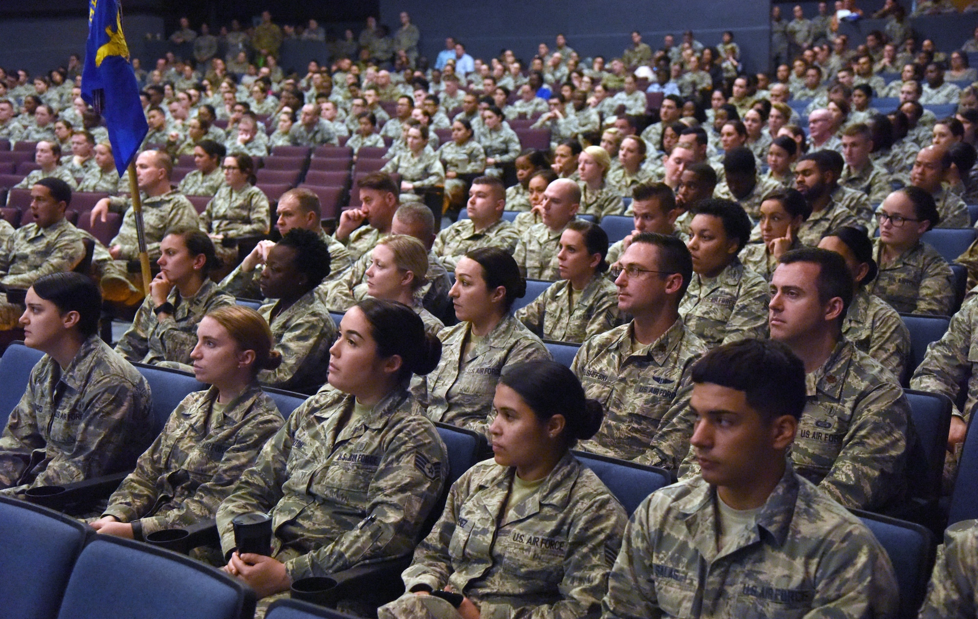 Keesler Medics attend a commanders call hosted by Col. Beatrice Dolihite, 81st Medical Group commander, at the Welch Theater on Keesler Air Force Base, Mississippi, Oct. 1, 2018. Dolihite briefed on the Keesler Medical Center's transition to the Defense Health Agency with the first phase of the transition beginning today. (U.S. Air Force photo by Kemberly Groue)