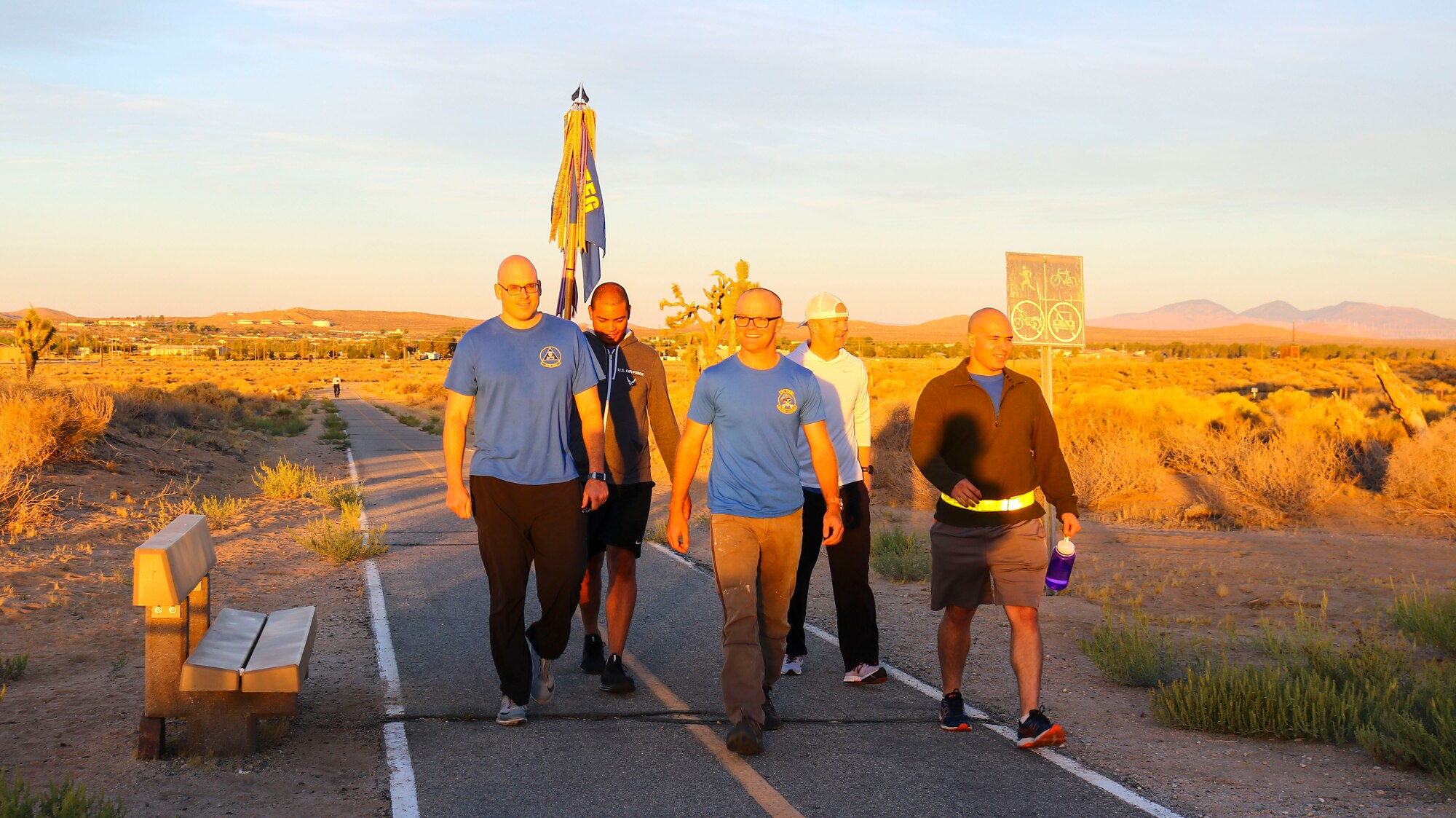 Participants of the Fight for Life Suicide Prevention and Awareness Event finish the final leg of the 12-hour relay at Edwards Air Force Base, California, Sept. 28-29. The event was an overnight relay ruck march, run or walk. (U.S. Air Force photo by Giancarlo Casem)