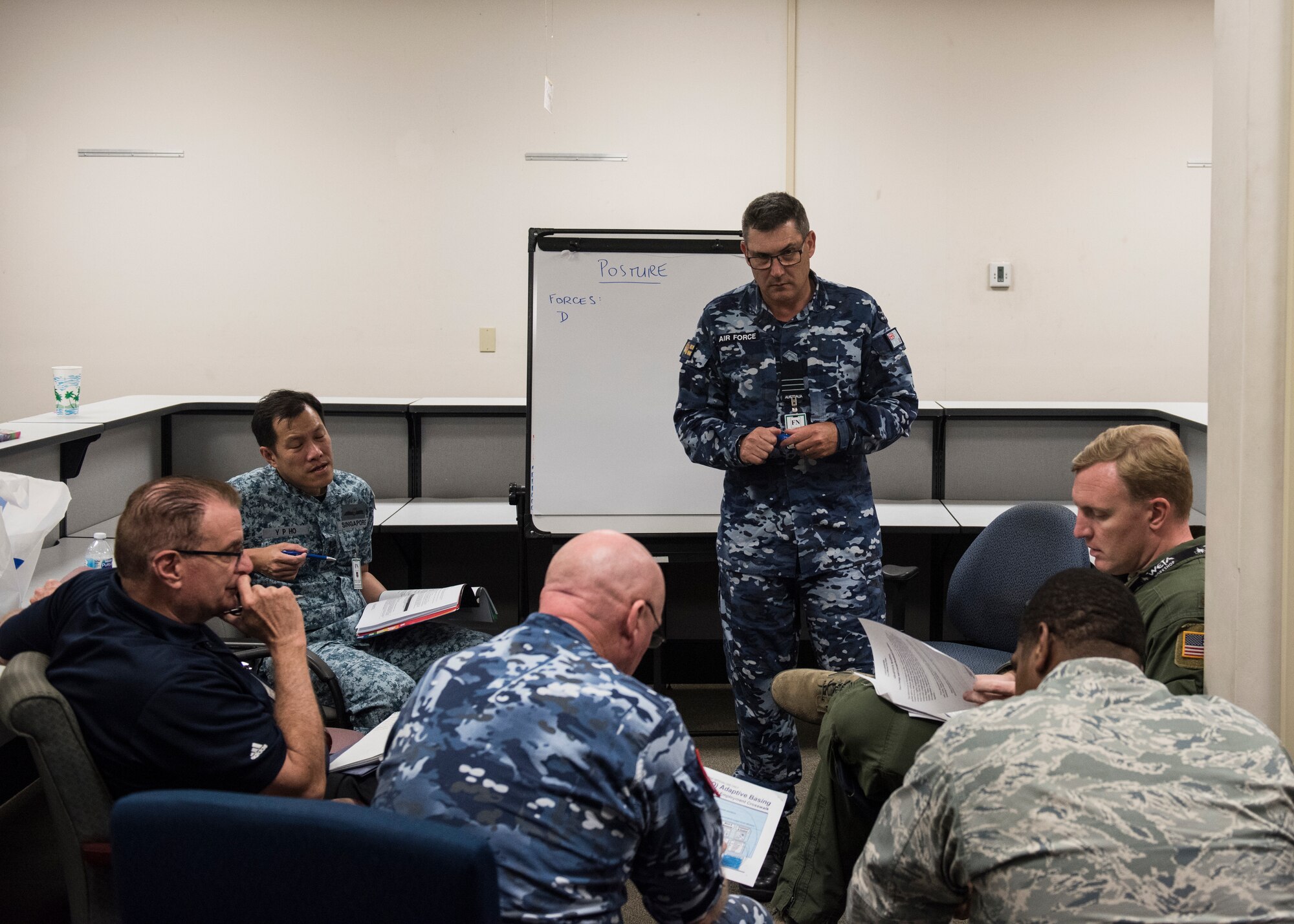 During an afternoon breakout season, Adaptive Basing and Agile Combat Employment Summit attendees discuss topic from the morning keynote presentations at Joint Base Pearl Harbor-Hickam, Sept. 10, 2018.