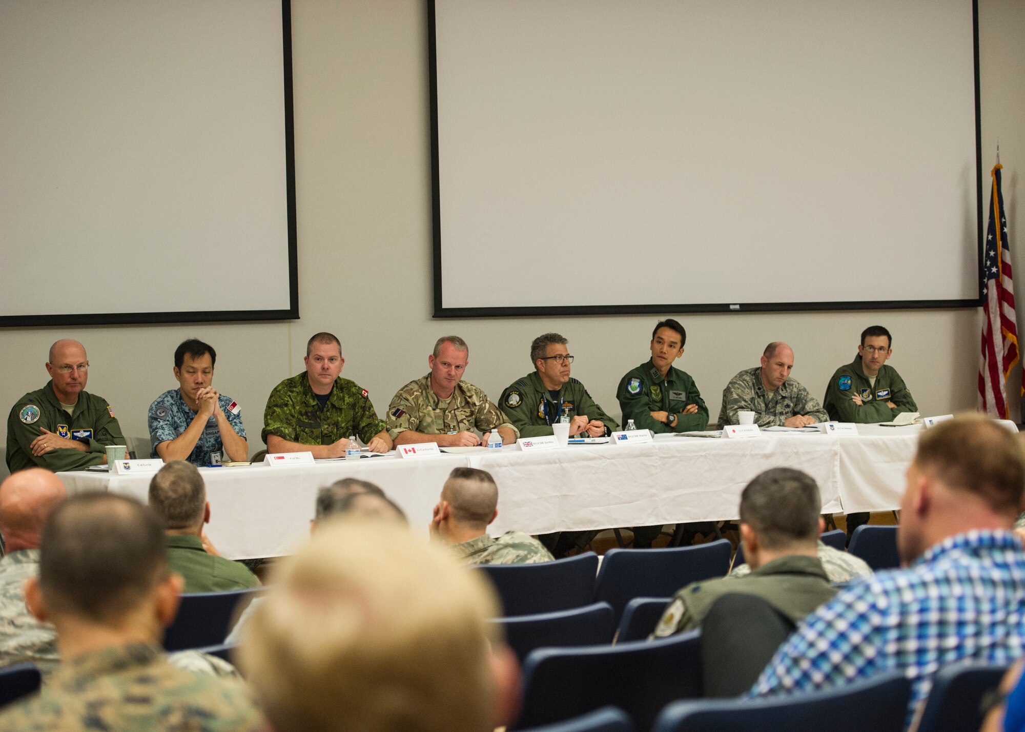 A panel of summit attendees from partner and ally nations answer questions during the Adaptive Basing and Agile Combat Employment Summit at Joint Base Pearl Harbor-Hickam, Sept. 13, 2018