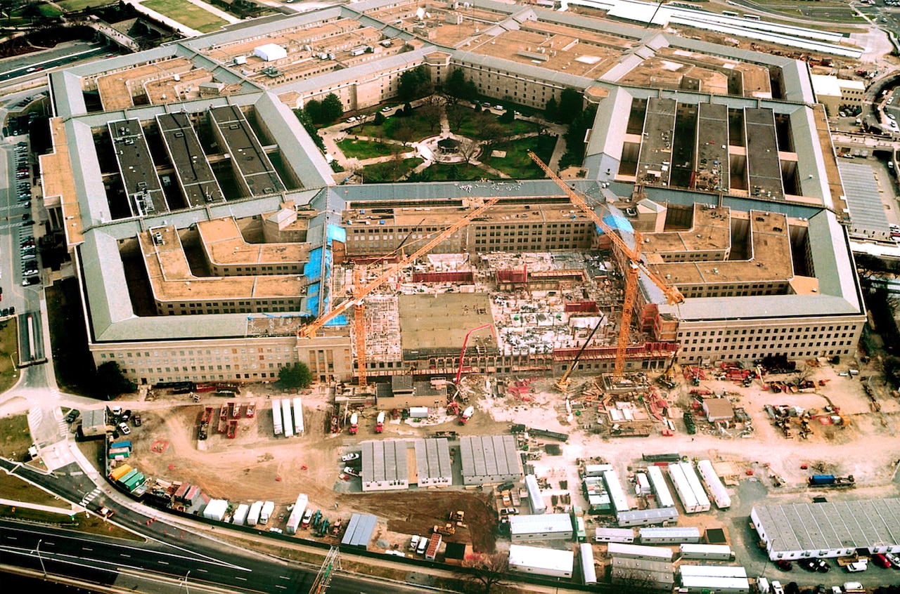 Construction crews work on floors and walls at the Pentagon
