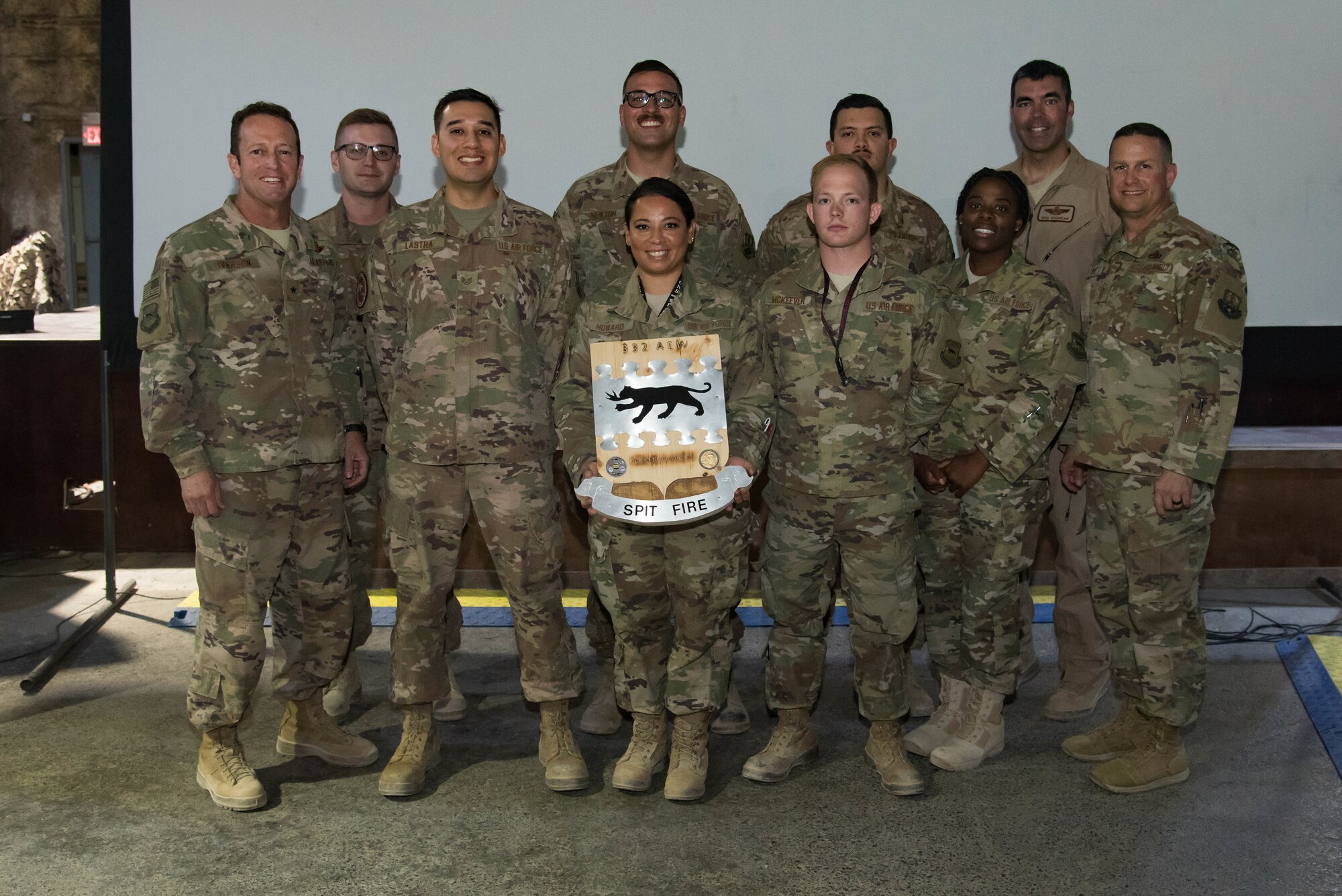 Brig, Gen, David Iverson, 332nd Air Expeditionary Wing commander, and Chief Master Sgt. Jason Tiek, 332nd Air Expeditionary Wing command chief, stand with the five finalists for the first Red Tails Commander’s Innovation Challenge, Sept. 28, 2018, at an undisclosed location in Southwest Asia.