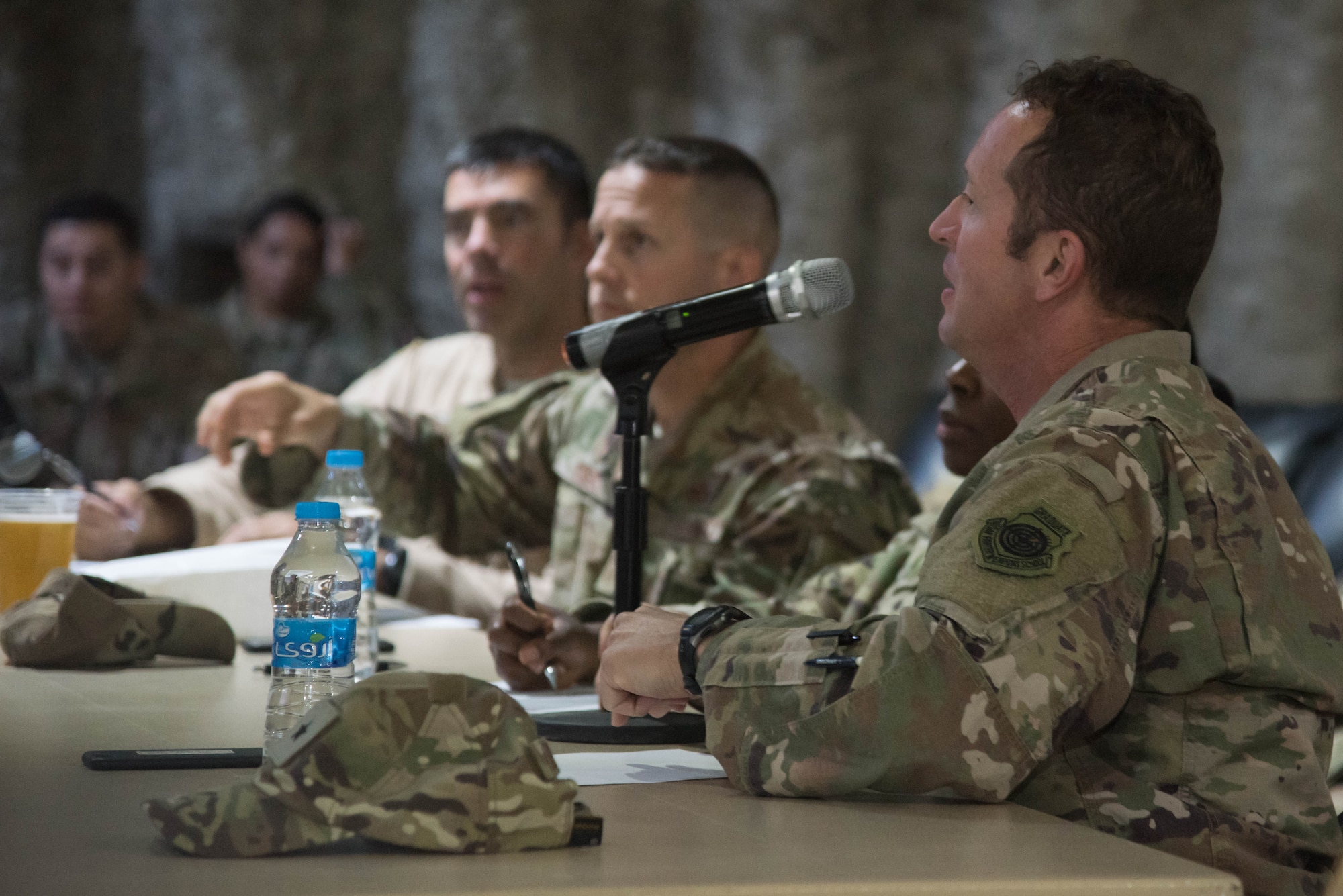 Brig. Gen. David Iverson, 332nd Air Expeditionary Wing commander, asks questions after a presentation during the first Red Tails Commander’s Innovation Challenge, Sept. 28, 2018, at an undisclosed location in Southwest Asia.