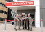 59th Medical Wing personnel cut the ribbon to officially transition the Urgent Care Clinic to a Family Emergency Center at Wilford Hall Ambulatory Surgical Center on Joint Base San Antonio-Lackland Oct. 1. The FEC will provide 24-hour emergency care to all Tricare beneficiaries in the San Antonio area who would have been previously transferred to local facilities.