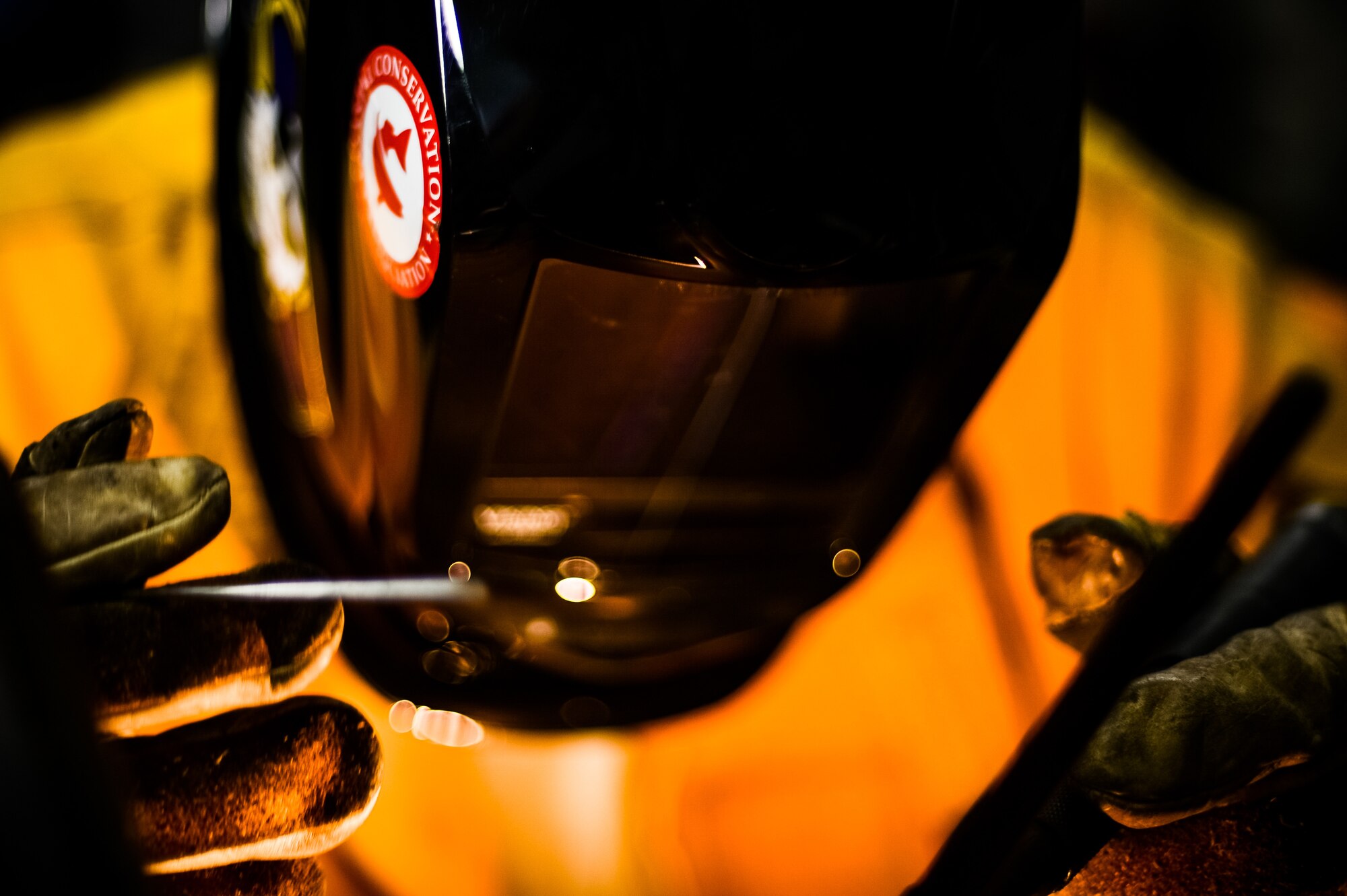 U.S. Air Force Staff Sgt. Matthew Mutz, 20th Equipment Maintenance Squadron aircraft metals technology journeyman, welds a metal rod at Shaw Air Force Base, S.C., Oct. 2, 2018.
