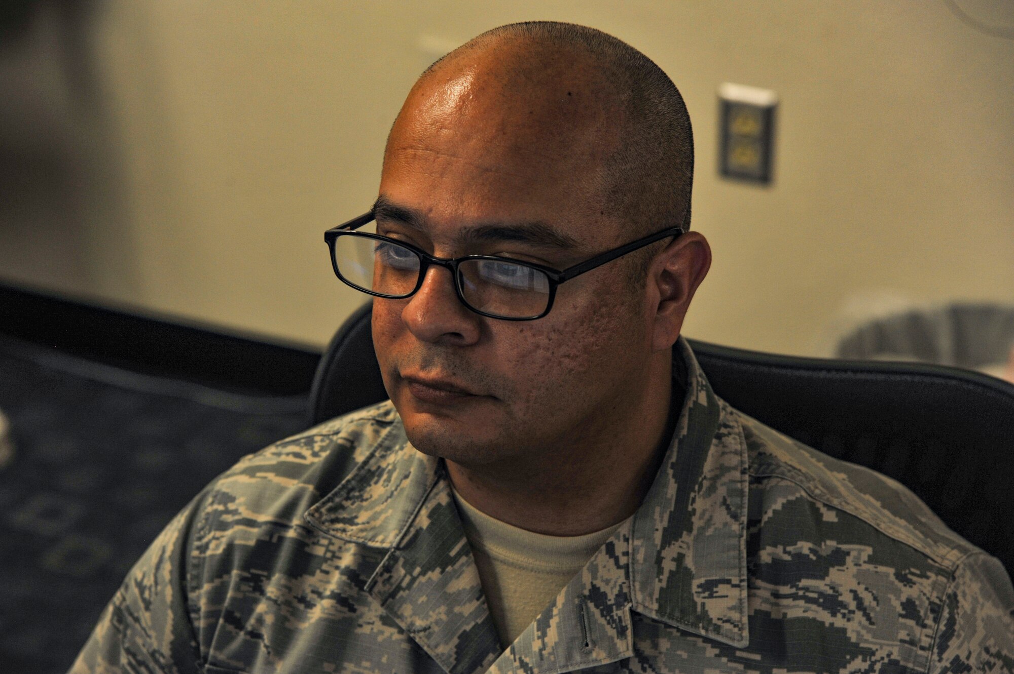 Master Sgt. Luis Sierra, flight chief for the 377th Comtroller Squadron Financial Analysis Office, crunches numbers as the end of Fiscal Year 2018 approaches. Sierra and dozens of CPTS, contracting and resource advisors across Kirtland raced to fund requirements with reallocated funds before the midnight Sept. 30 deadline. (U.S. Air Force photo by Jim Fisher)