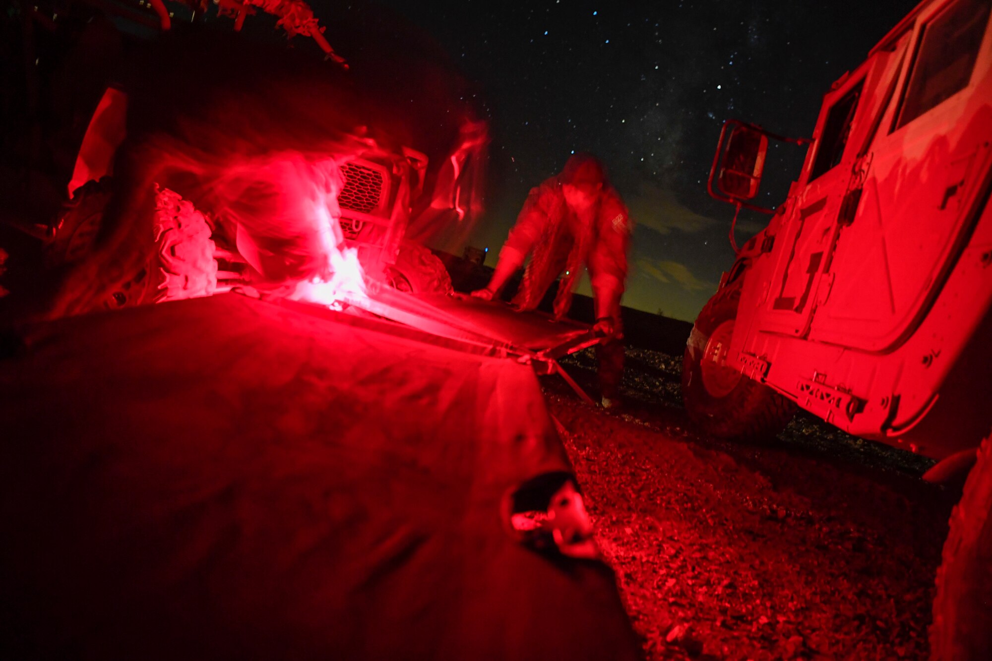 Special Tactics Airmen from the 21st Special Tactics Squadron from Pope Army Airfield, Fort Bragg, North Carolina, set up sleeping arrangements and a security detail during a scenario as part of NTC 18-10 at Fort Irwin, California, Sept. 4, 2018.