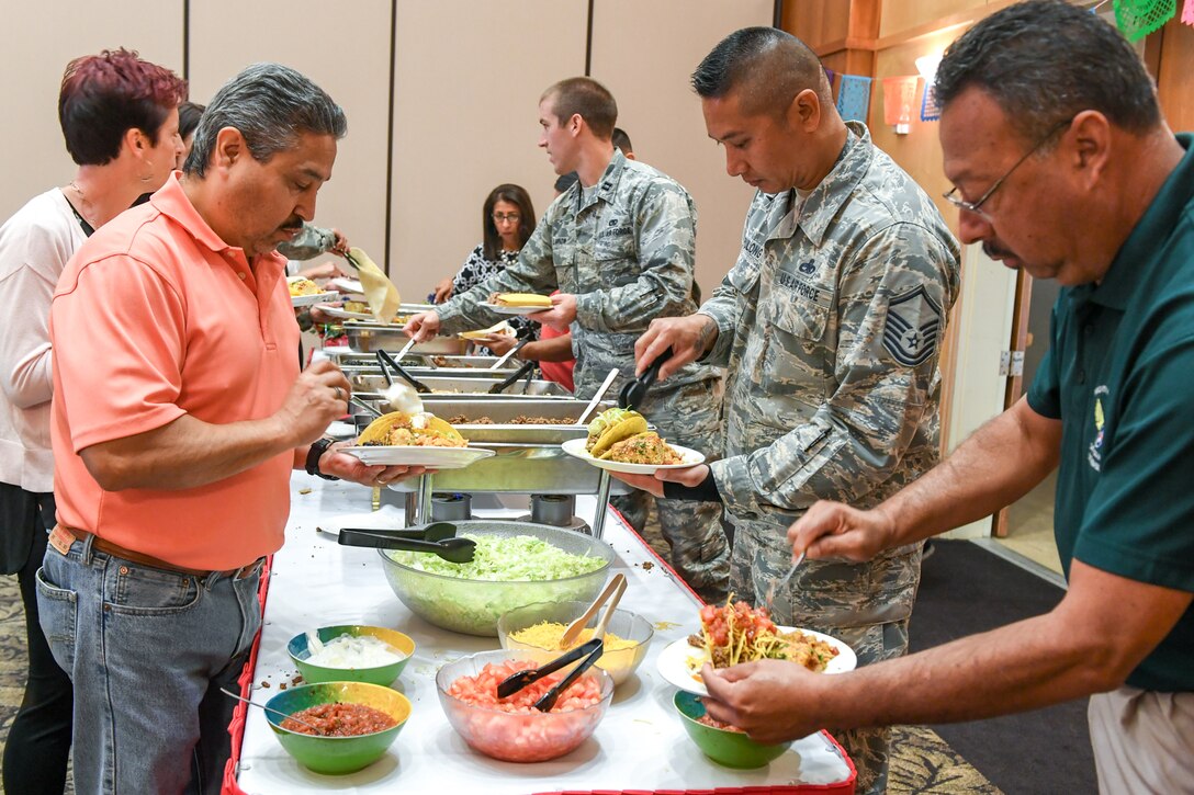 Attendees at the Hispanic Heritage Awareness Luncheon enjoy a taco bar Sept. 20, 2018, at Hill Air Force Base, Utah. The theme of this year's luncheon was Energizing our Nation's Diversity. (U.S. Air Force photo by Cynthia Griggs)