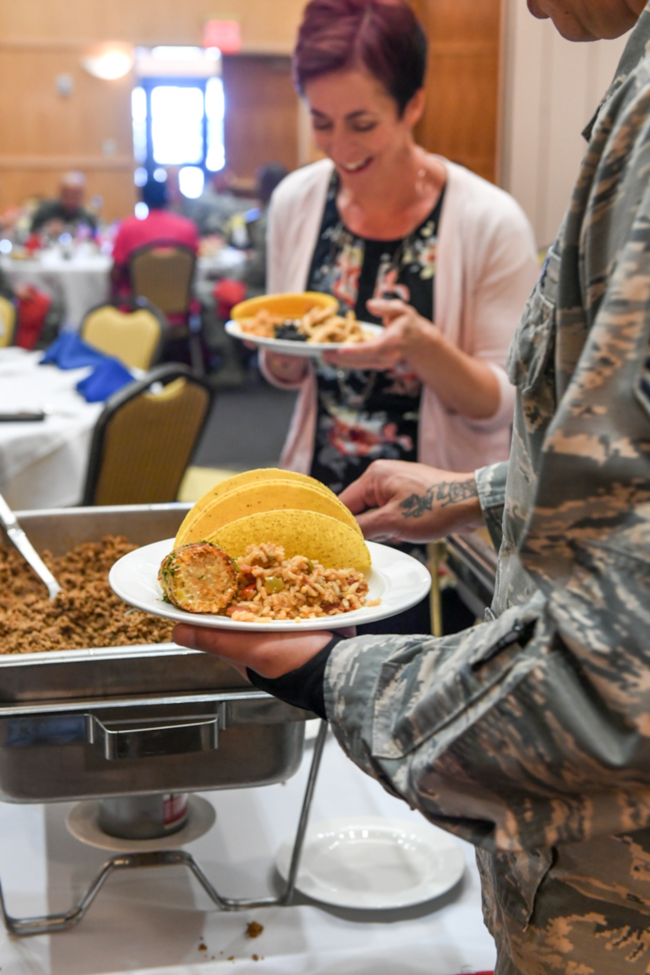 Attendees at the Hispanic Heritage Awareness Luncheon enjoy a taco bar Sept. 20, 2018, at Hill Air Force Base, Utah. The theme of this year's luncheon was Energizing our Nation's Diversity. (U.S. Air Force photo by Cynthia Griggs)