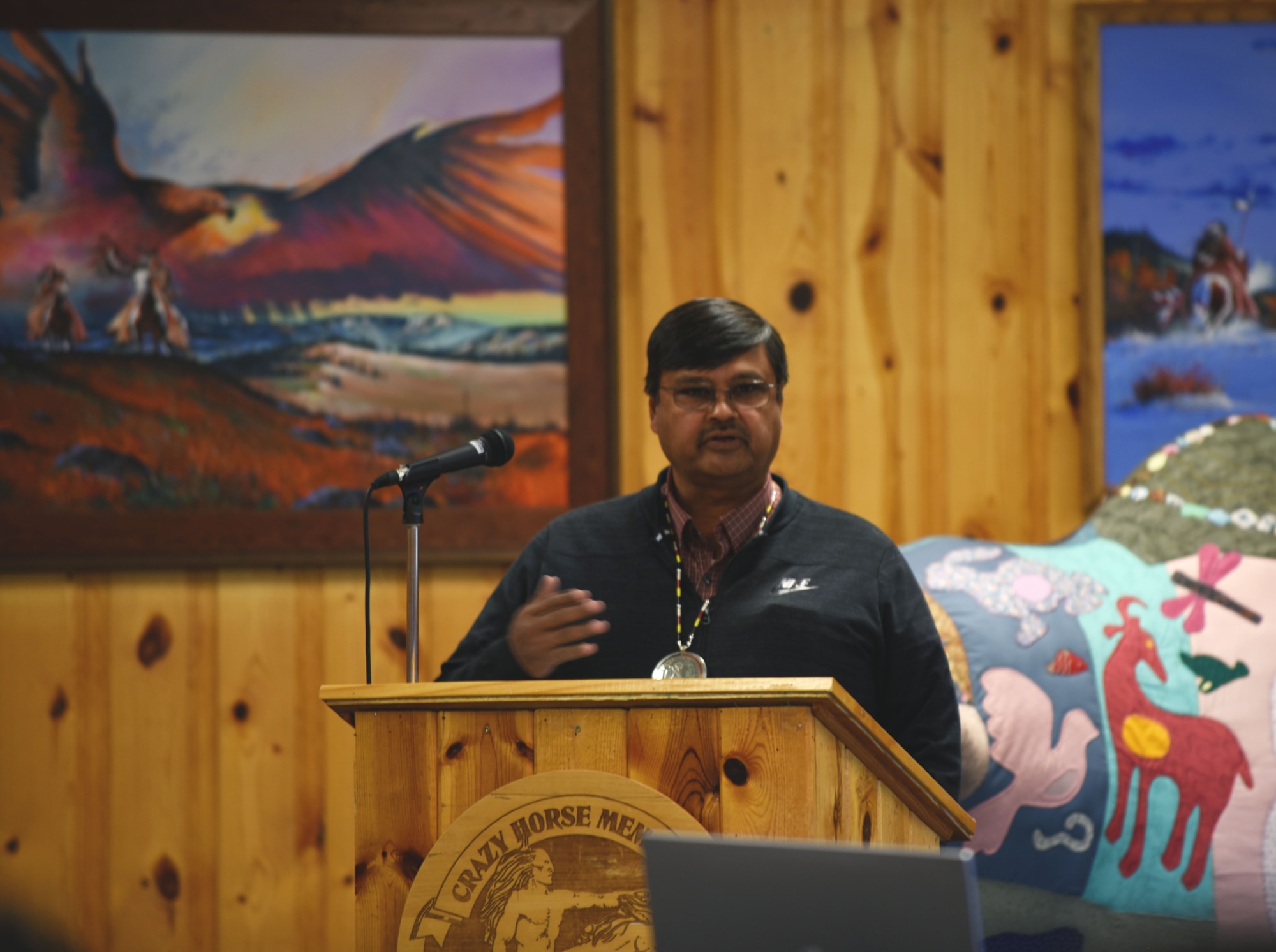 Boyd I. Gourneau, Chairman of the Lower Brule Sioux Tribe, performs the opening prayer at the Governors’ Interstate Indian Council assembly at Crazy Horse Memorial in Custer County, S.D., Sept. 26, 2018. Representatives from numerous states attended the 2018 GIIC assembly to discuss issues that influence the lives of Native American people across the country. (U.S. Air Force photo by Airman Christina M. Bennett)