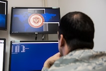 A U.S. Cyber Command Airman reviews simulated cyber threat information during Cyber Defensive Cooperation at Podgorica, Montenegro, Sept. 28, 2018. Defensive cyber cooperation is part of U.S. Cyber Command and U.S. European Command efforts to support NATO allies and European partners by helping build their cyber defense capabilities. This collaboration builds cyber defense capabilities while enabling the teams to learn from one another and demonstrates that we will not tolerate foreign malign influence on the democratic processes of our allies and partners or in the U.S. (U.S. Army photo by Spc. Craig Jensen)