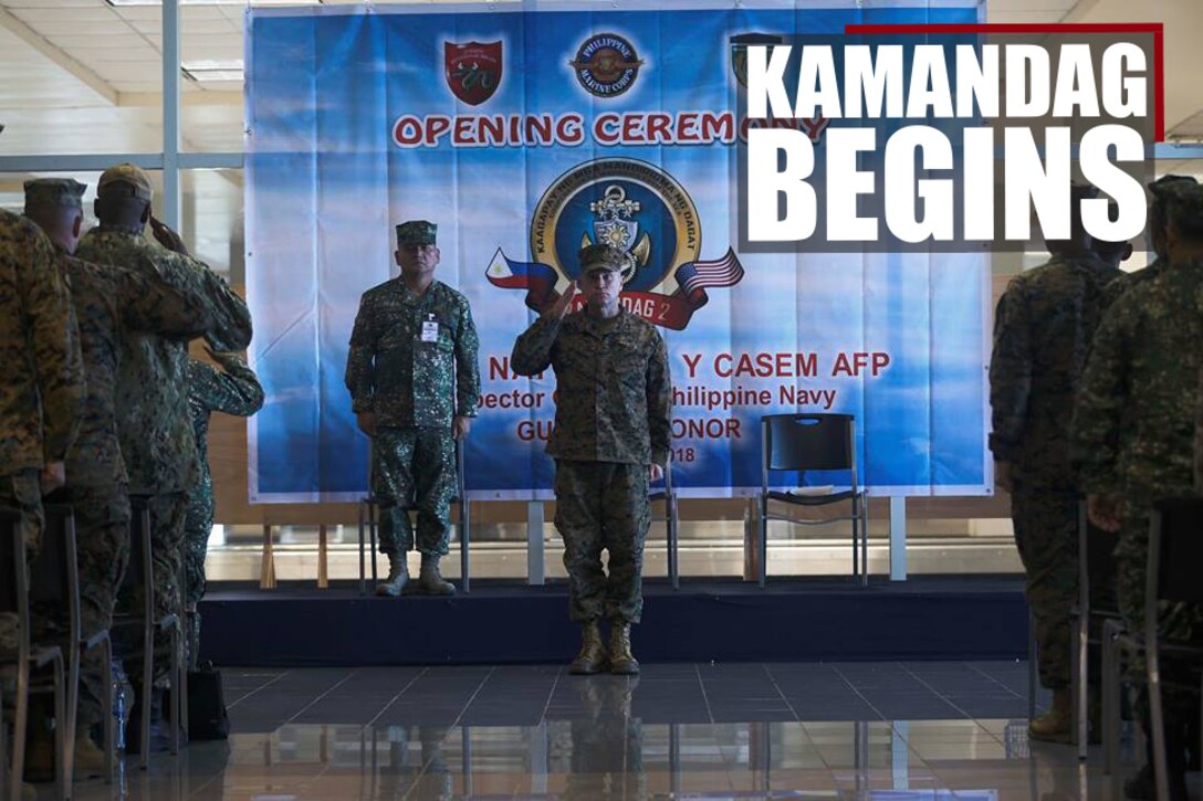 Philippine, Japanese, and U.S. service members prepare for the opening ceremony of KAMANDAG 2 in Subic Bay, Philippines, Oct. 1, 2018. The U.S. is proud to participate in this Philippines-led exercise in order to conduct capabilities development training that enhances our forces' tactics, techniques and procedures across a wide range of military operations. (U.S. Marine Corps photo by Sgt. Mackenzie Carter)