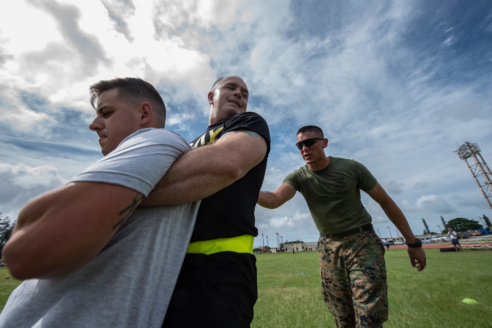 U.S. Army Spc. Tanner Moran, carries U.S. Air Force Staff Sgt. Colin Casey, both Okinawa Joint Experience Green Team students, during the Okinawa Joint Fitness Challenge Sept. 26, 2018, at Kadena Air Base, Japan. The OJFC was a portion of the OJE that enabled students to bond while overcoming obstacles and challenges faced in the battlefield. (U.S. Air Force photo by Staff Sgt. Micaiah Anthony)