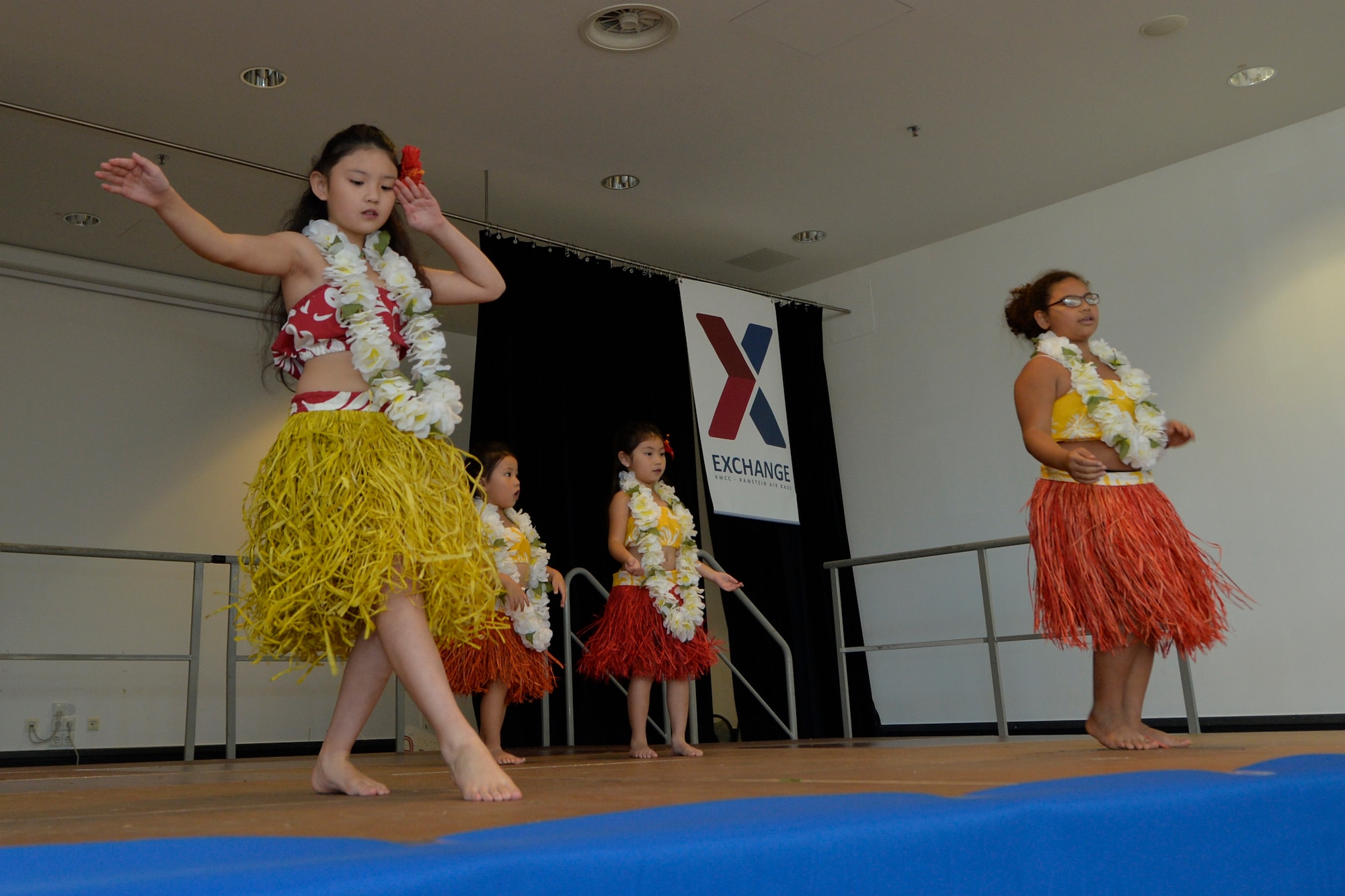 Kaiserslautern Military Community members perform a native hula dance during the 86th Airlift Wing’s Diversity Day on Ramstein Air Base, Sept. 28, 2018. The event aimed to enhance cross-cultural and cross-gender awareness while promoting harmony among all military members, their families, and the DOD civilian workforce. (U.S. Air Force photo by Staff Sgt. Nesha Humes Stanton)