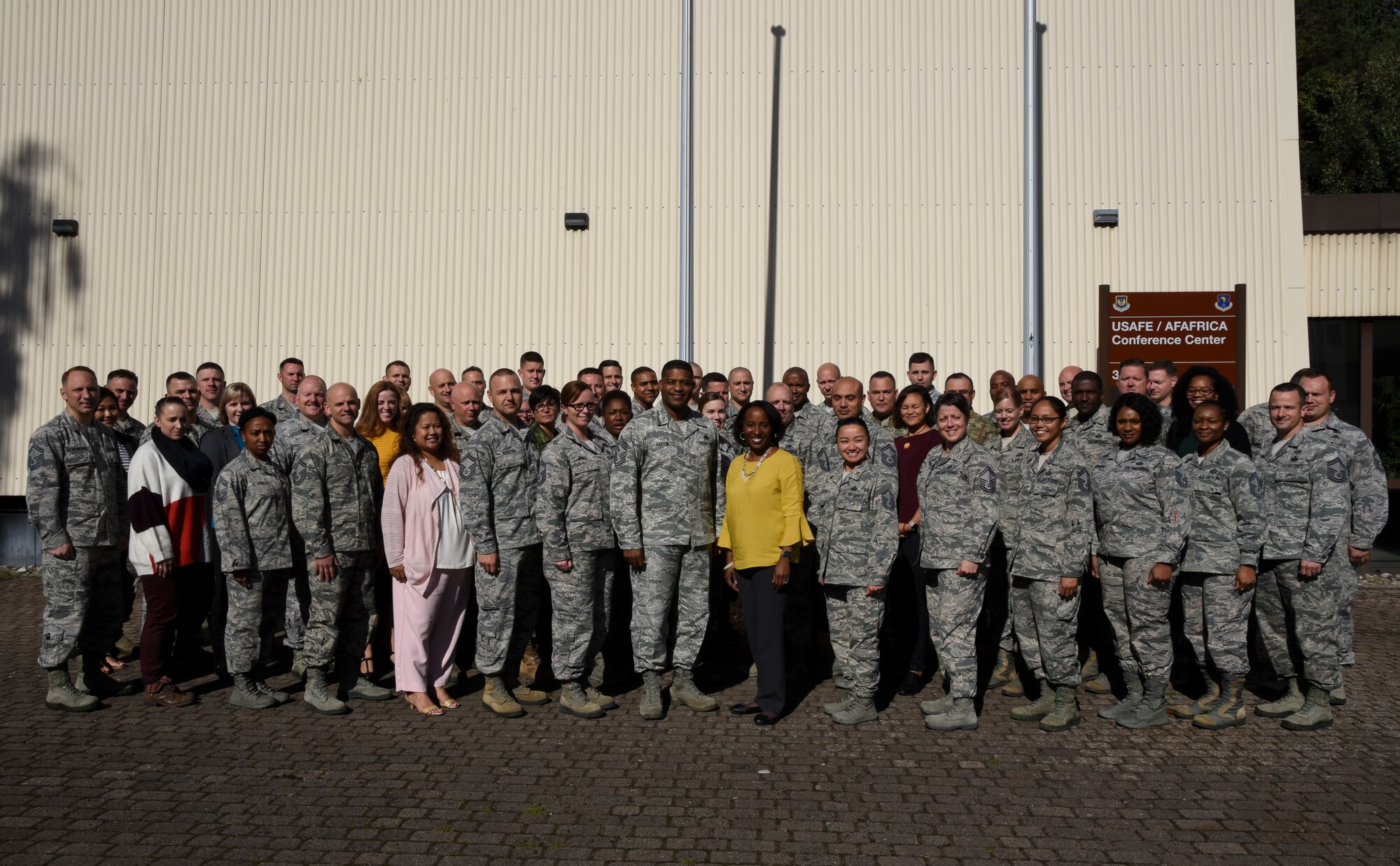 Attendees of the U.S. Air Forces in Europe and U.S. Air Forces Africa Squadron Superintendent and Spouse course pose for a photo outside the USAFE conference center on Ramstein Air Base, Germany, Sept. 25, 2018. Forty-five superintendents and nine spouses, to include two members from joint services as well as a coalition partner, attended the course geared towards superintendents who have been in the position less than a year and those who have been vectored toward the job. (U.S. Air Force photo by Airman D. Blake Browning)