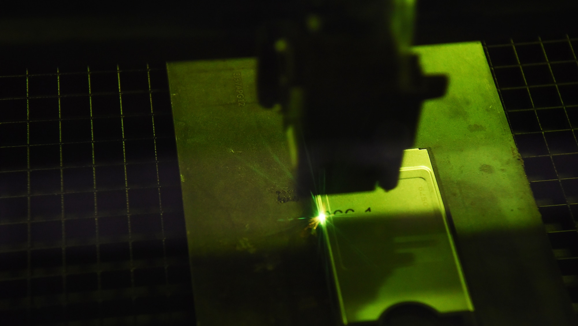 A 28th Maintenance Squadron tool crib laser engraver is used to label an aircraft part at Ellsworth Air Force Base, S.D., Sept. 11, 2018. The tool crib maintains, distributes and accounts for a multitude of tools used by Airmen in the 37th and 34th Bomb Squadrons for maintenance and repair of the base’s fleet of B-1s. (U.S. Air Force photo by Airman 1st Class Thomas Karol)