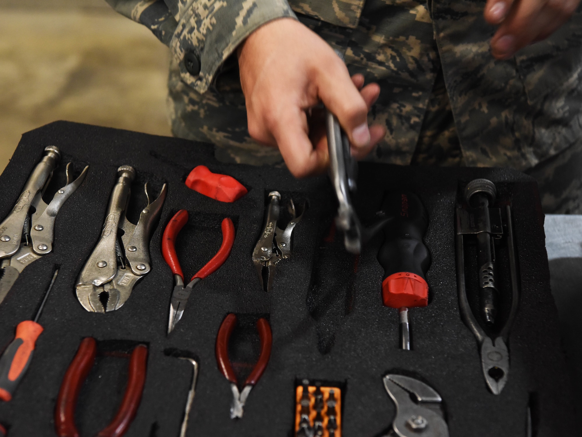 Airman 1st Class Casey Pelt, a 28th Aircraft Maintenance Squadron B-1 crew chief, checks out tools before he starts his shift at Ellsworth Air Force Base, S.D., Sept. 11, 2018. The 28th Maintenance Squadron tool crib maintains, distributes and accounts for a multitude of equipment used by Airmen in the 37th and 34th Bomb Squadrons for maintenance and repair of the base’s fleet of B-1s. (U.S. Air Force photo by Airman 1st Class Thomas Karol)