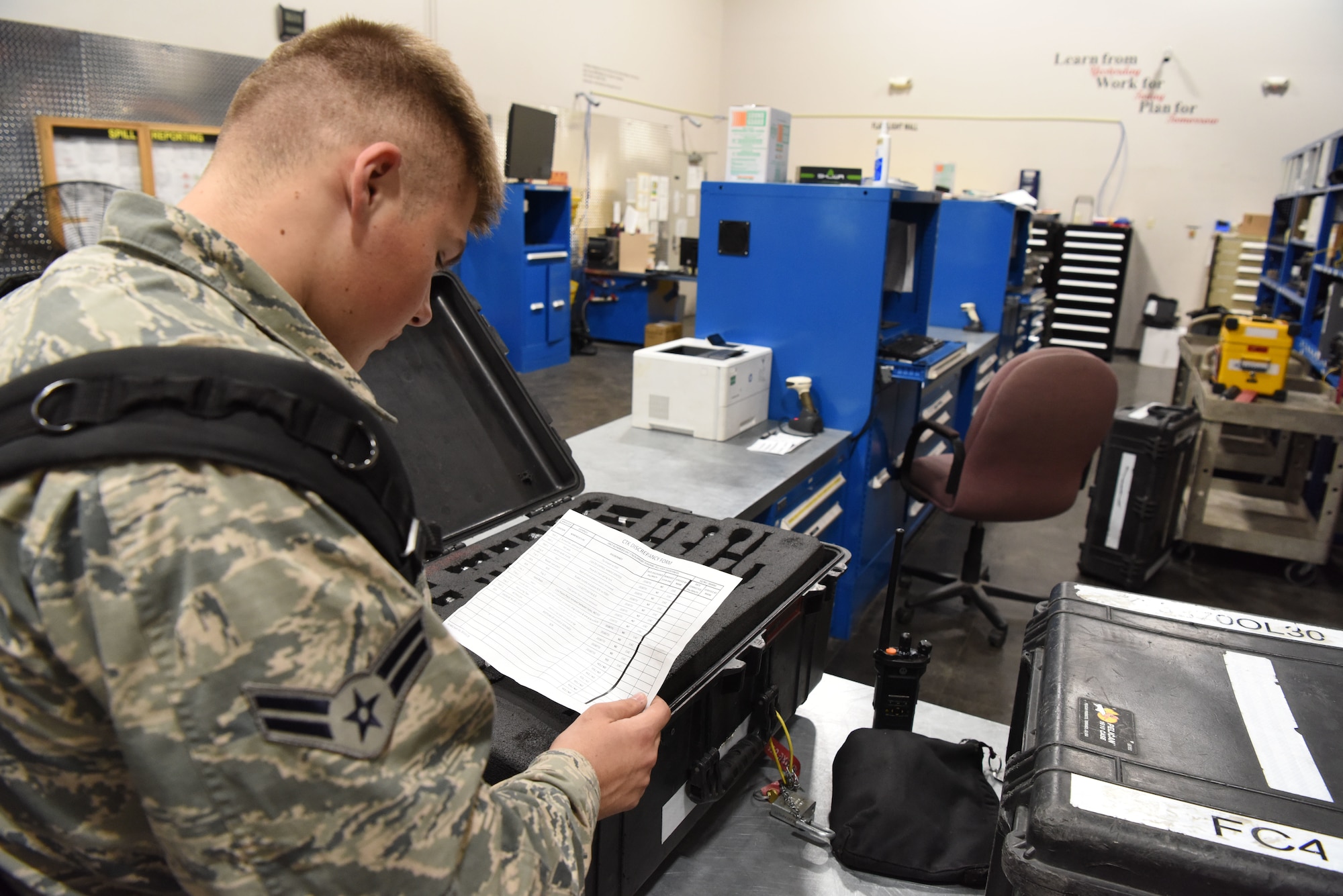 Airman 1st Class Cole Childers, a 28th Aircraft Maintenance Squadron B-1 crew chief, looks at a checklist while in the tool crib at Ellsworth Air Force Base, S.D., Sept. 11, 2018. Maintainers from the 37th and 34th Bomb Squadrons utilize equipment and tools from the 28th Maintenance Squadron tool crib to make sure the base’s B-1s are flight-worthy and ready to deploy at a moment’s notice. (U.S. Air Force photo by Airman 1st Class Thomas Karol)