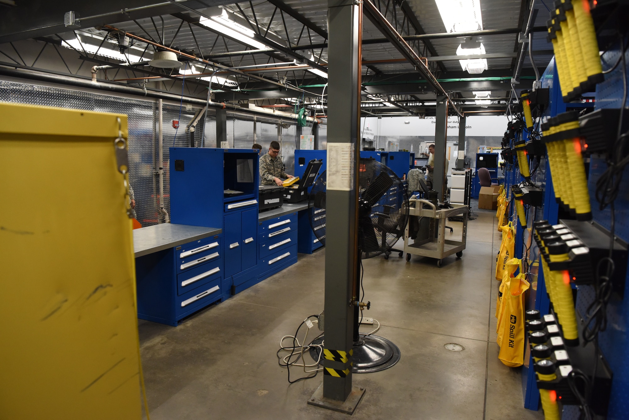 The 28th Maintenance Squadron tool crib checks out tools to maintenance Airmen working the evening shift at Ellsworth Air Force Base, S.D., Sept. 11, 2018. The tool crib maintains, distributes and accounts for a multitude of tools used by Airmen in the 37th and 34th Bomb Squadrons for maintenance and repair of the base’s fleet of B-1s. (U.S. Air Force photo by Airman 1st Class Thomas Karol)