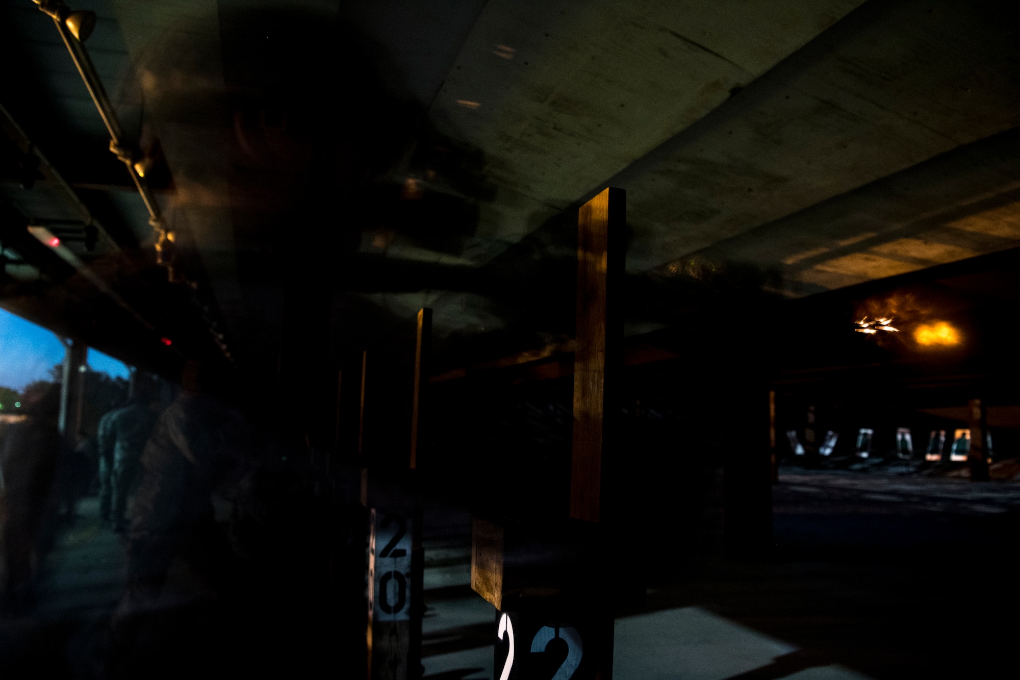 U.S. Air Force Senior Airman Cordyon Scott, 633rd Security Forces Squadron Base Defense Operations Center controller, fires the M4 carbine during night fire weapons training at Joint Base Langley-Eustis, Virginia, August 23, 2018.