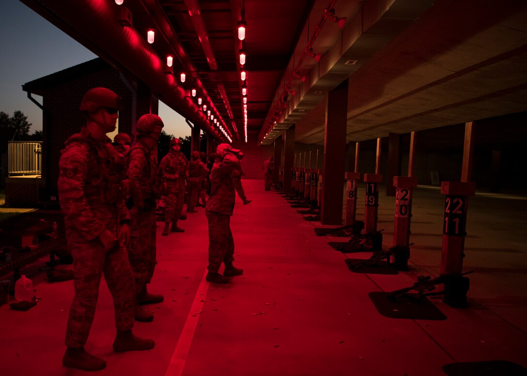 U.S. Air Force Airmen assigned to the 633rd Security Forces Squadron attend night fire weapons training at Joint Base Langley-Eustis, Virginia, August 23, 2018.