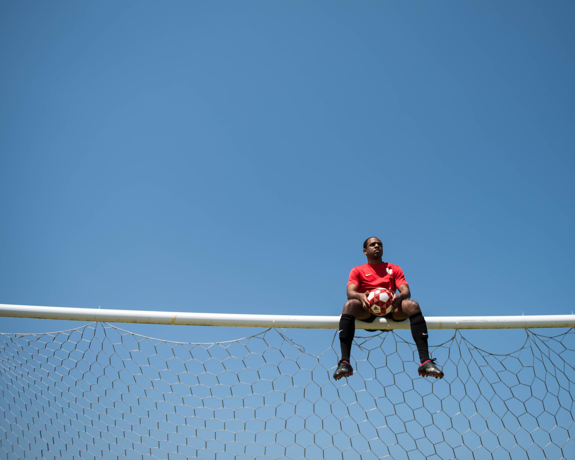 U.S. Air Force Airman 1st Class Jairzinho Burke, 633rd Air Base Wing Judge Advocate paralegal, thinks about the upcoming games at Joint Base Langley-Eustis, Virginia, April 13, 2018.