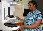 Maria O’Berry, a mammographer in the Women’s Health Clinic at Wilford Hall Ambulatory Surgical Center on Joint Base San Antonio-Lackland, prepares a “phantom breast” to calibrate the imaging equipment. The 59th Medical Wing is hosting a breast cancer awareness fair and routine walk-in mammogram screenings in October for Breast Cancer Awareness month.