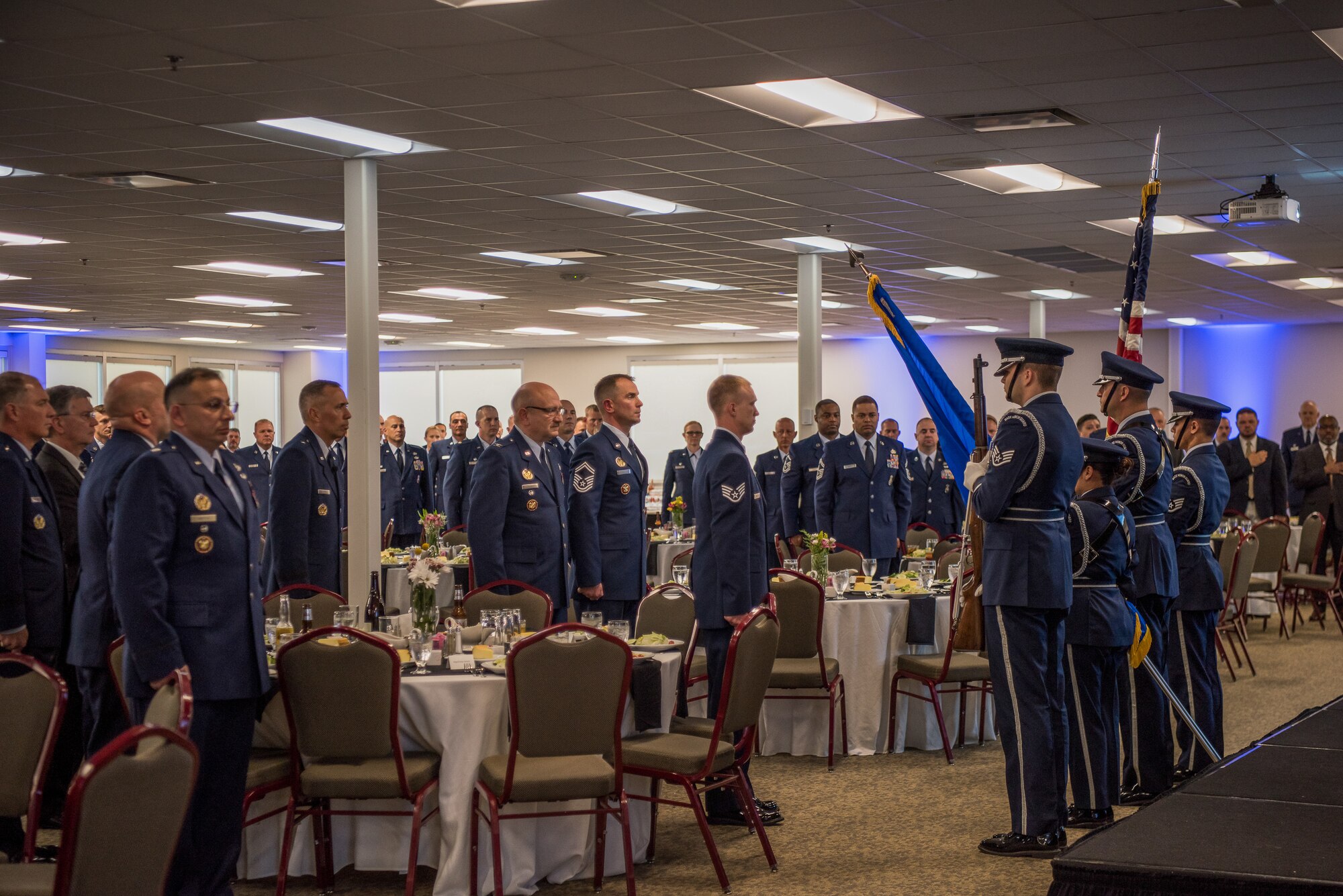 The 137th Special Operations Wing Honor Guard presents the colors at the 2018 Air National Guard Security Forces Squadron Dinner and Awards Banquet at the National Center for Employee Development Conference Center in Norman, Okla., Sept. 12, 2018. Every year, leadership from all of the Air National Guard security forces squadrons meet in one place to discuss past, current and upcoming topics that impact the career field, as well as recognize outstanding security forces Airmen. (U.S. Air National Guard Photo by Staff Sgt. Kasey M. Phipps)