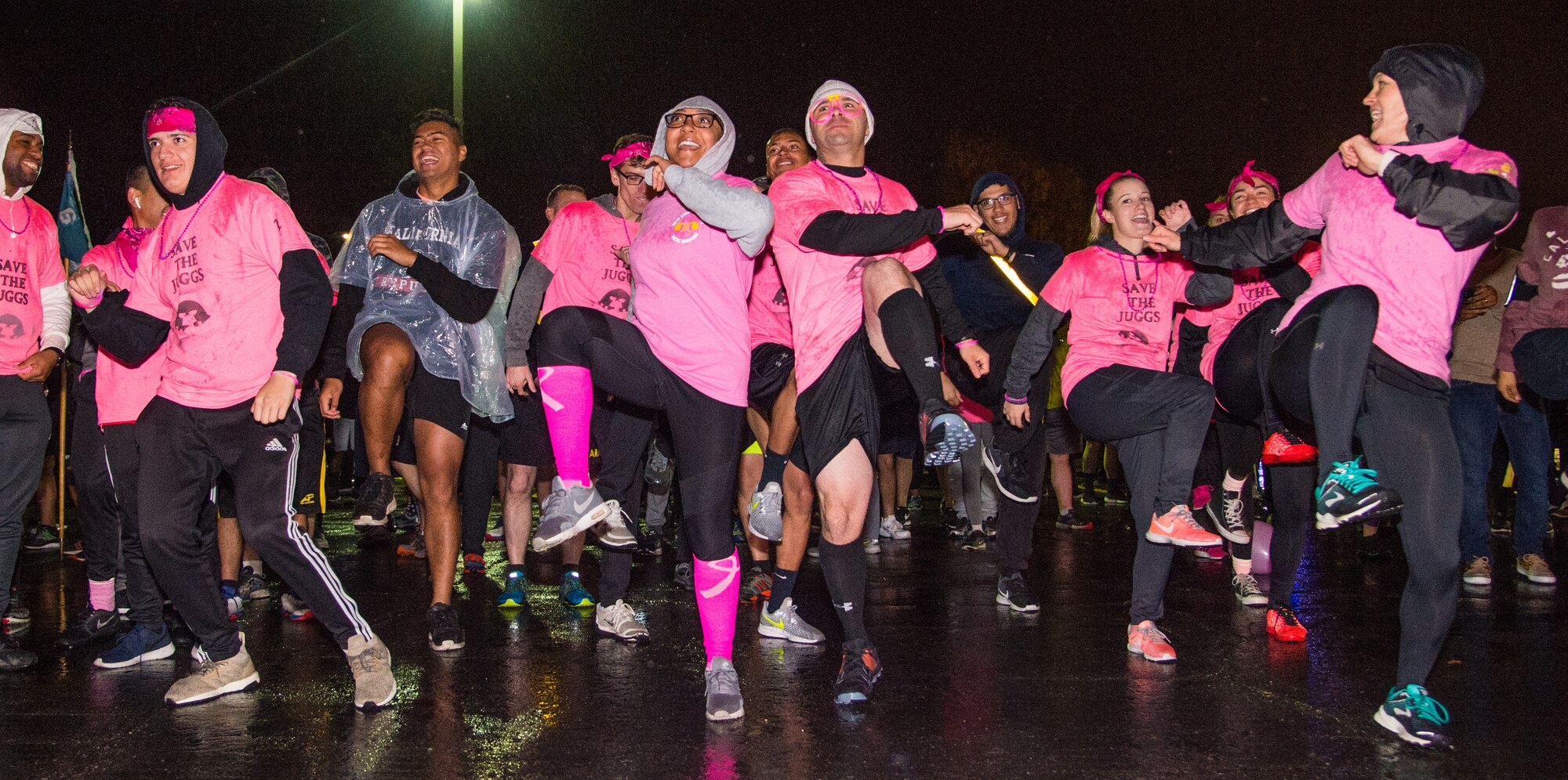 Soldiers, Airmen and members of the Joint Base Elmendorf-Richardson community warm up with a dance session before a breast cancer awareness 5K run at JBER, Alaska, Sept. 28, 2018. More than 300 people rallied together to support Breast Cancer Awareness Month. The National Breast Cancer Awareness Foundation estimates 220,000 U.S. women will be diagnosed with breast cancer each year and over 40,000 will perish. Although breast cancer in men is uncommon, an estimated 2,150 men will be diagnosed with breast cancer and approximately 410 perish each year.